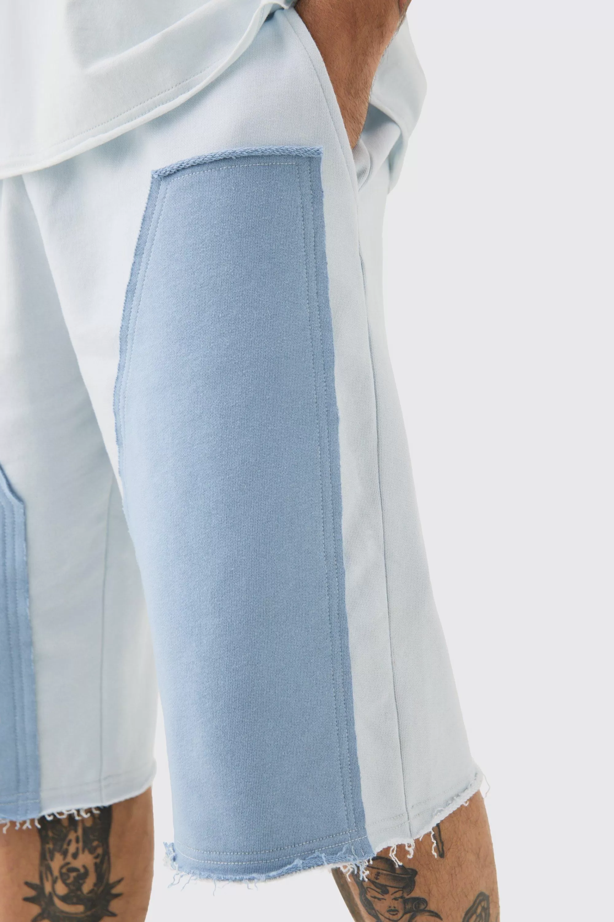 boohooMAN Baggy Carpenter Panel Frayed Edge Applique Jorts | UK