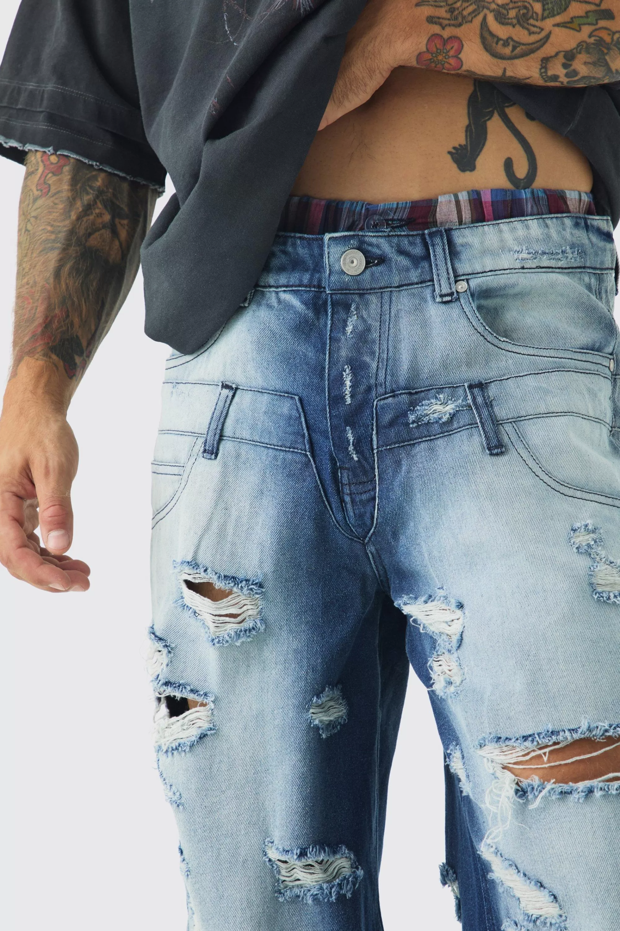 boohooMAN Baggy Fit Double Boxer Waistband All Over Ripped Jeans | UK