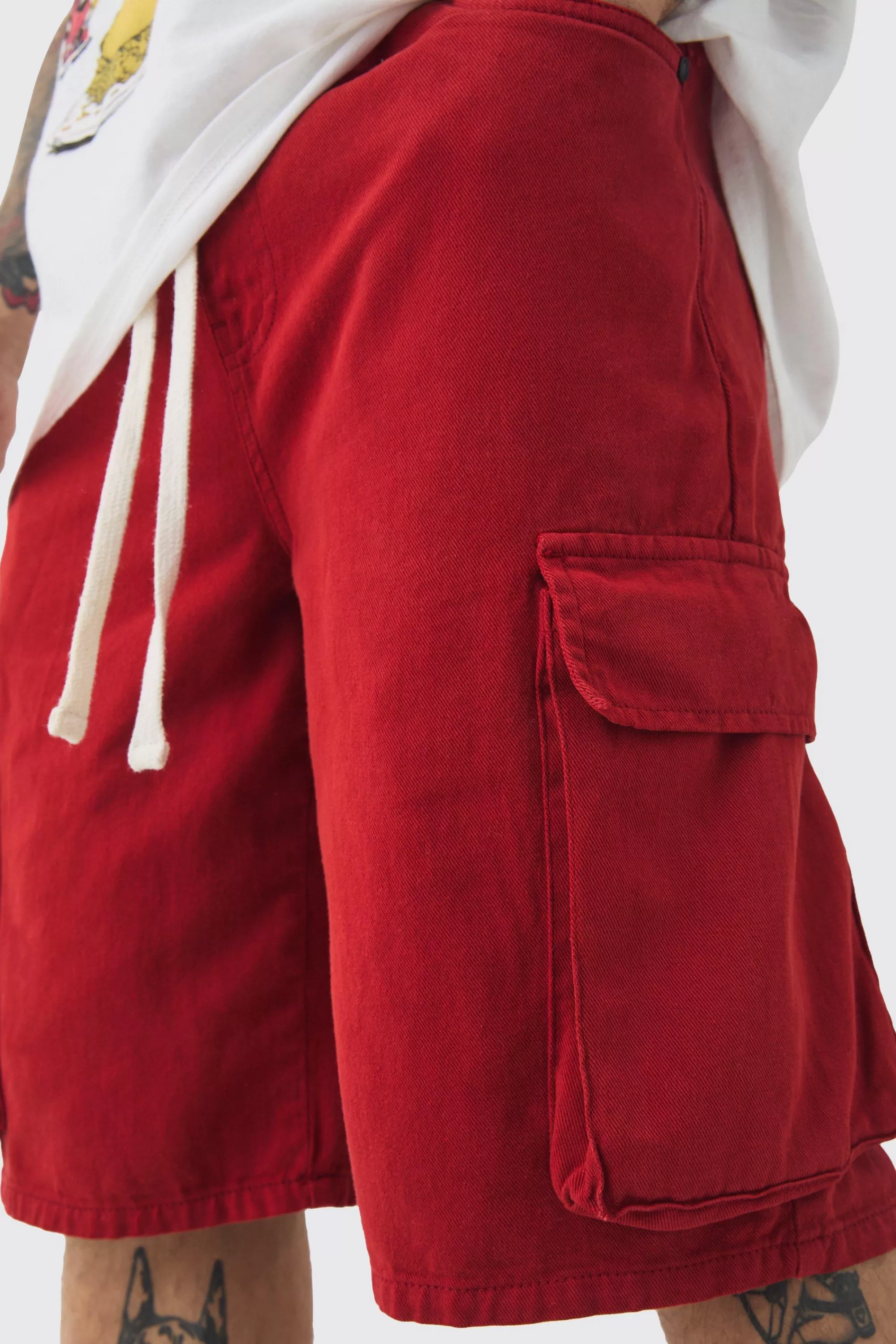 boohooMAN Baggy Fit Elasticated Waist Extended Drawcord Cargo Shorts | UK