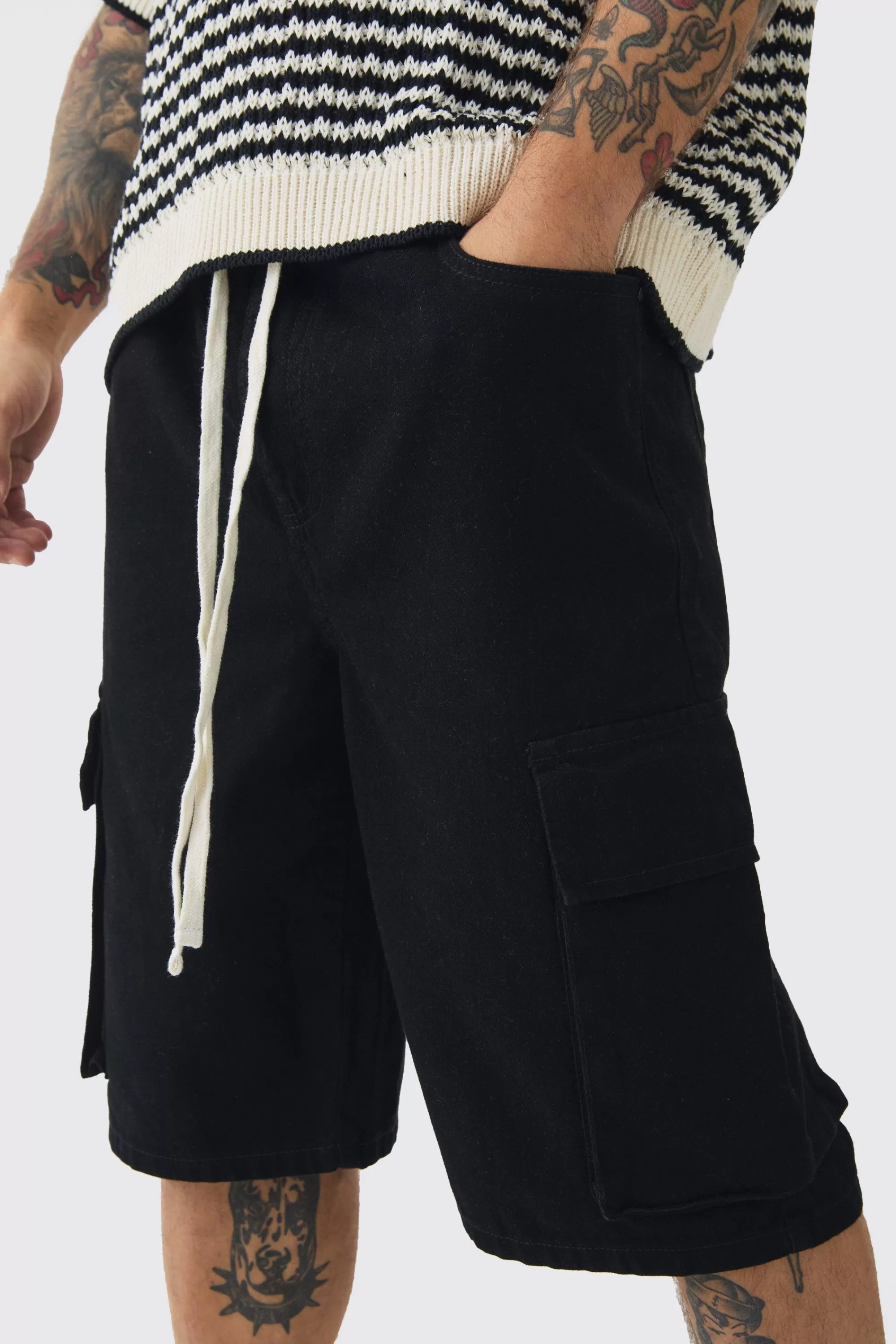 boohooMAN Baggy Fit Elasticated Waist Extended Drawcord Cargo Shorts | UK