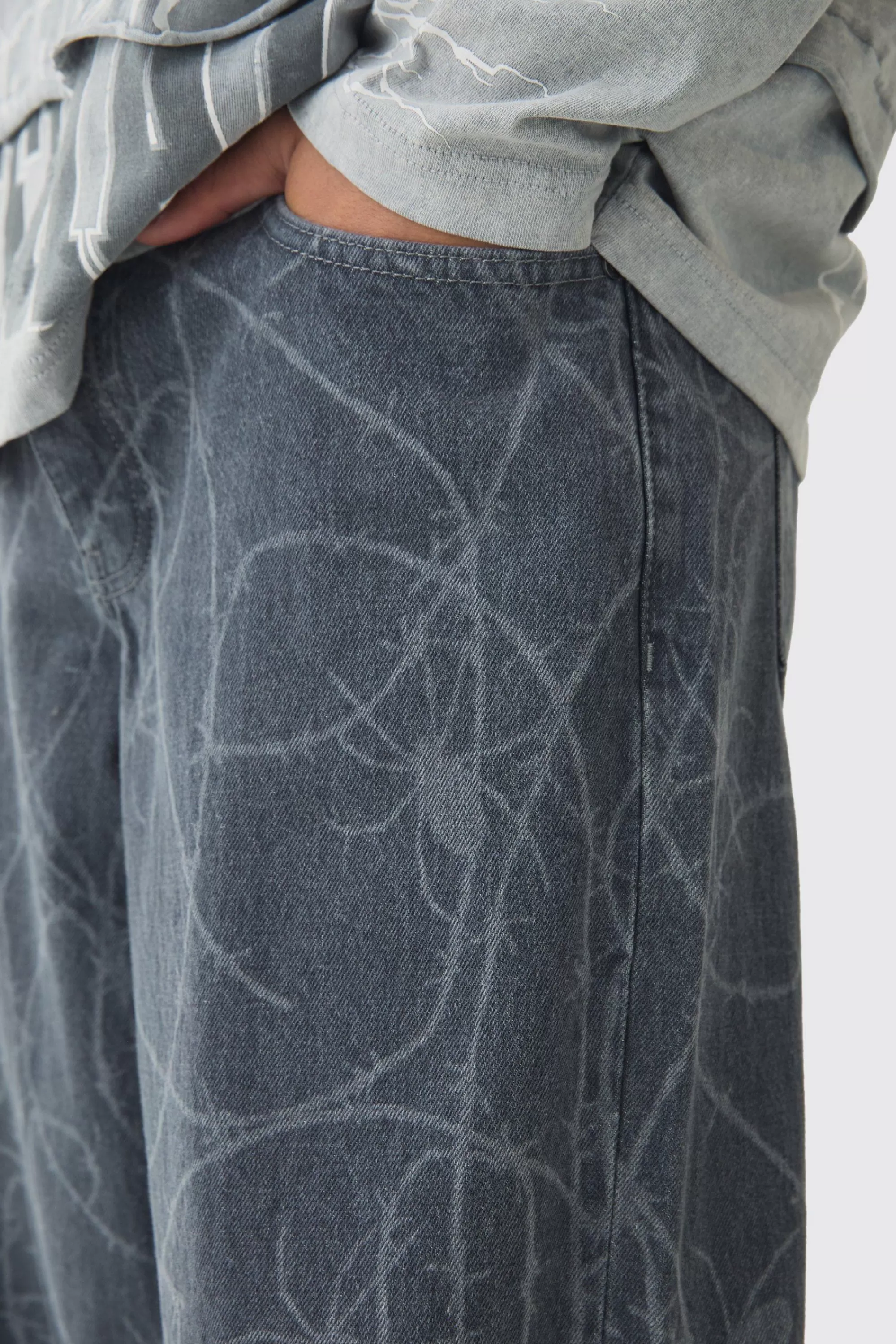 boohooMAN Baggy Fit Rigid Barbed Wire Laser Print Jeans | UK