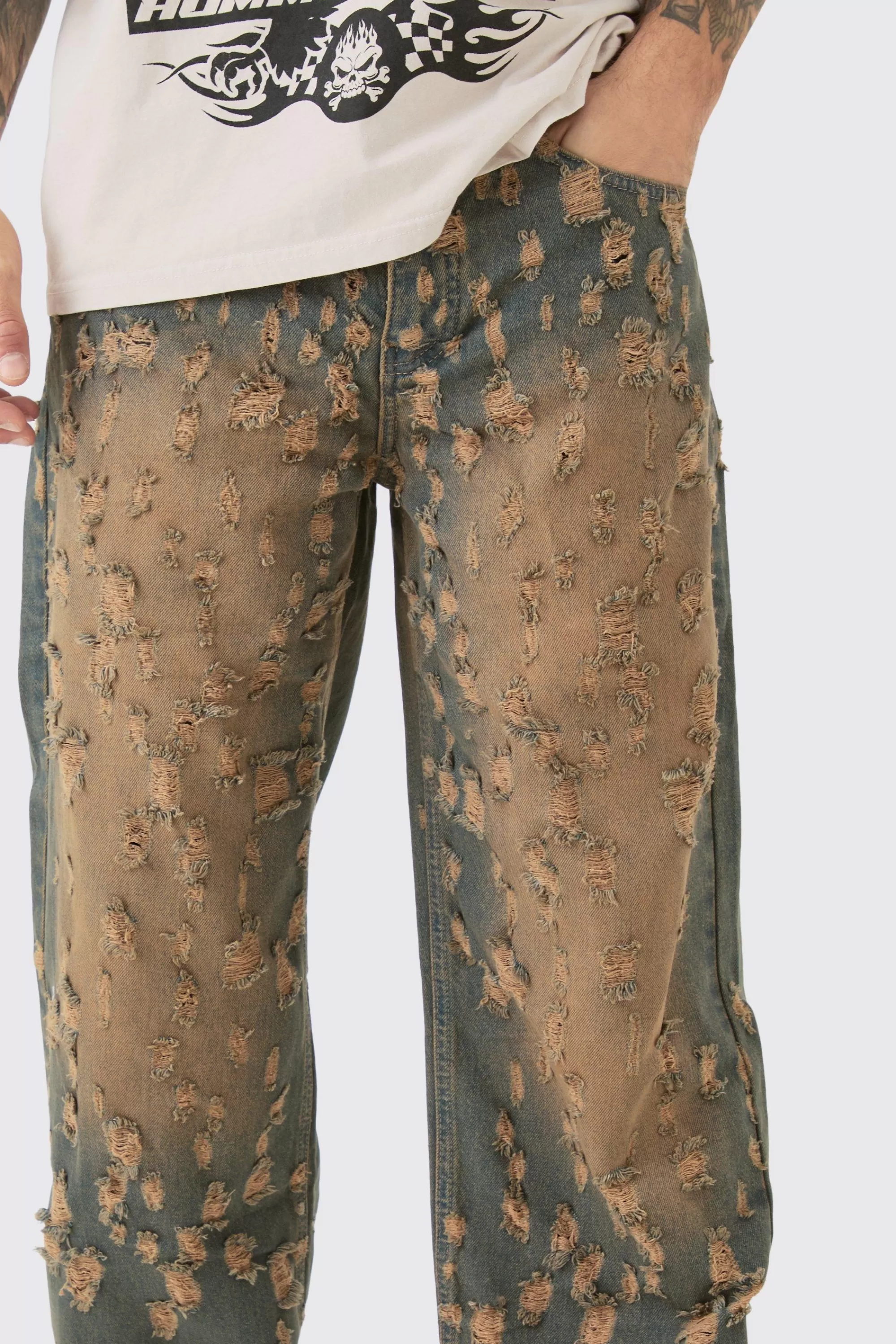 boohooMAN Baggy Rigid All Over Distressed Jeans In | UK