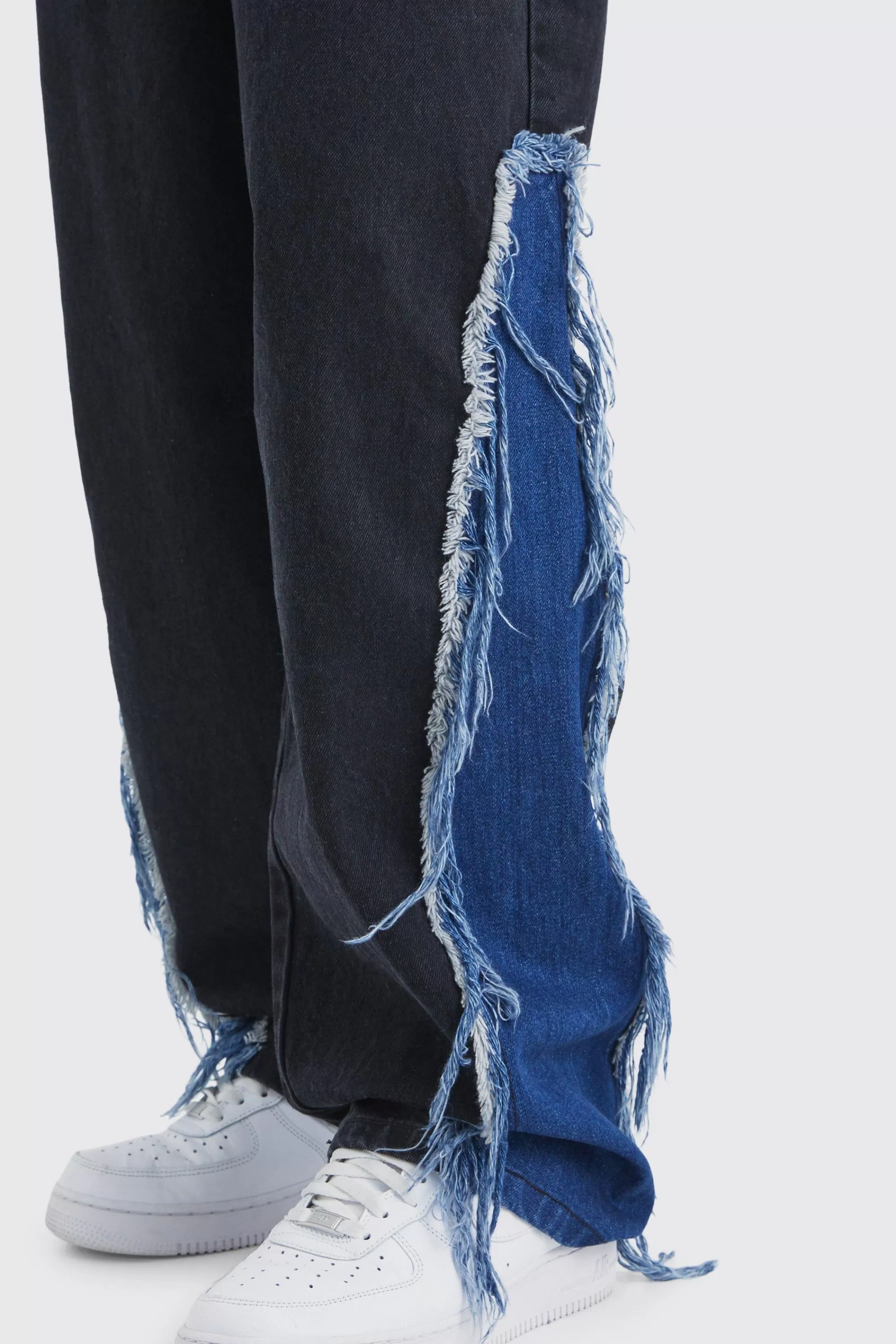 boohooMAN Baggy Rigid Frayed Spliced Jeans In | UK