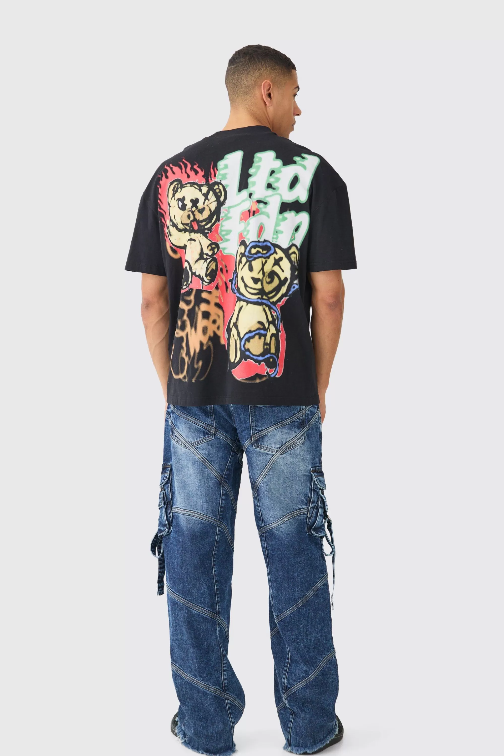 boohooMAN Baggy Rigid Strap And Buckle Detail Jeans In | UK