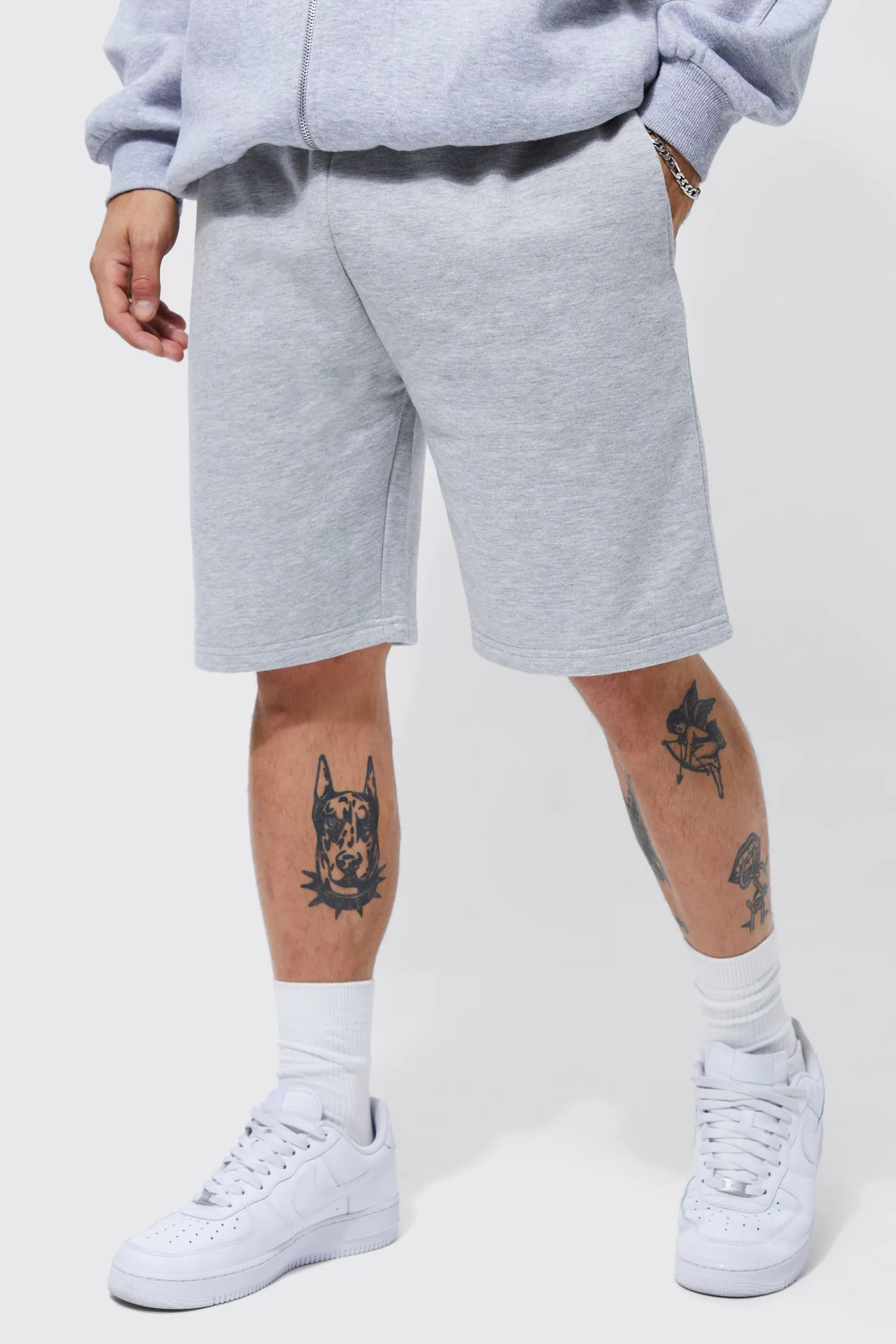 boohooMAN Basic Loose Fit Mid Length Jersey Short | UK