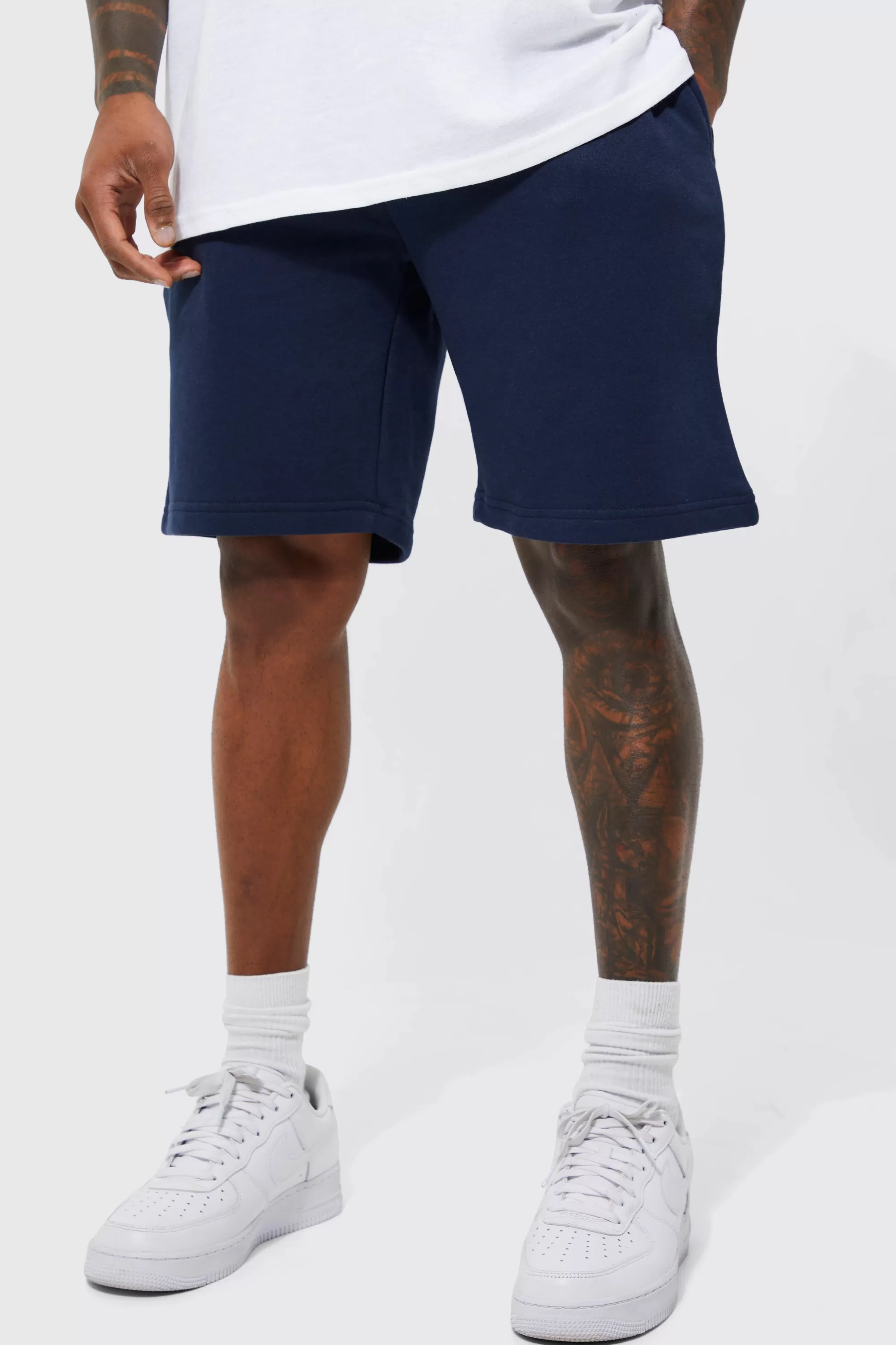 boohooMAN Basic Loose Fit Mid Length Jersey Short | UK