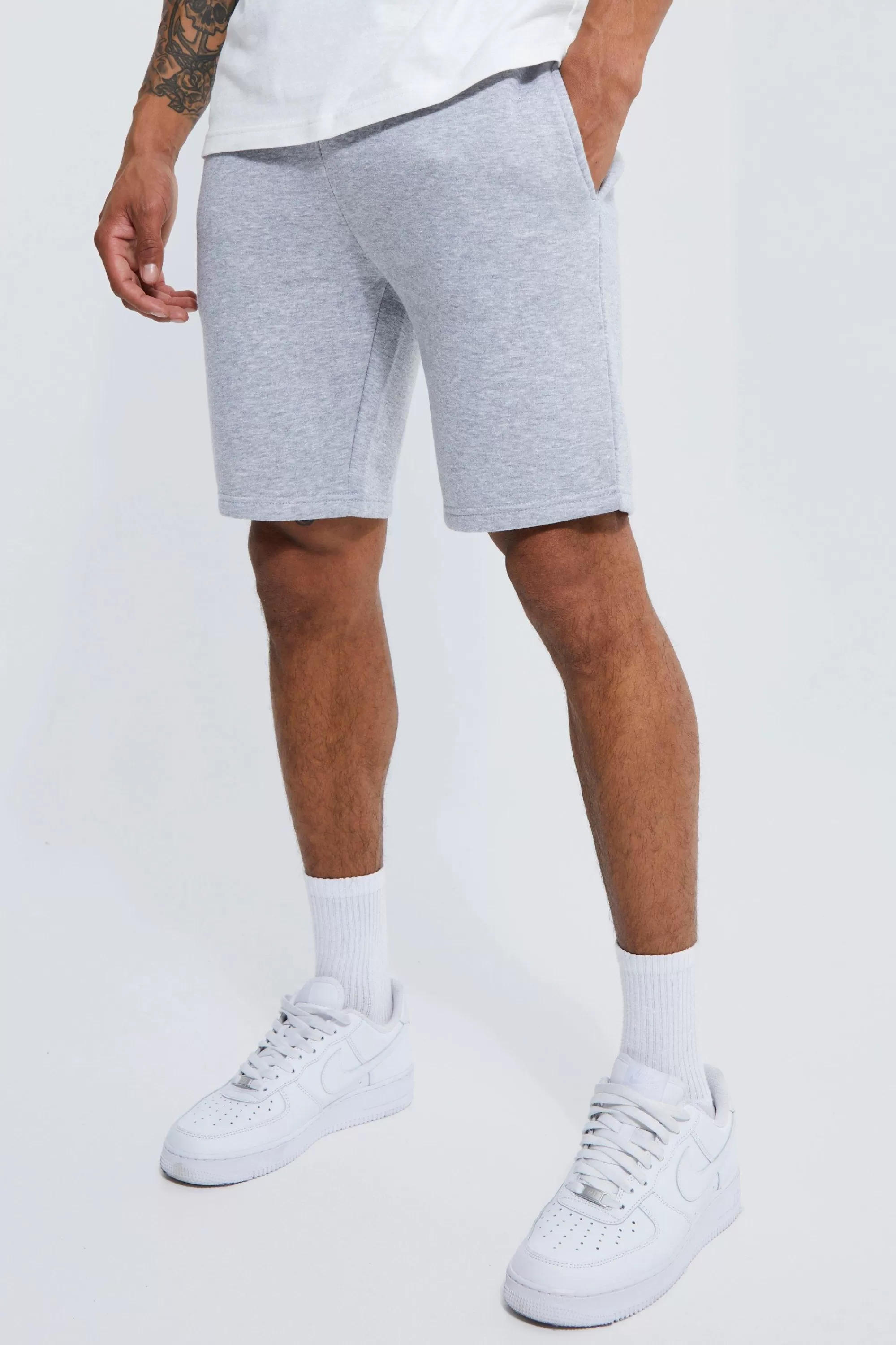 boohooMAN Basic Slim Fit Mid Length Jersey Short | UK