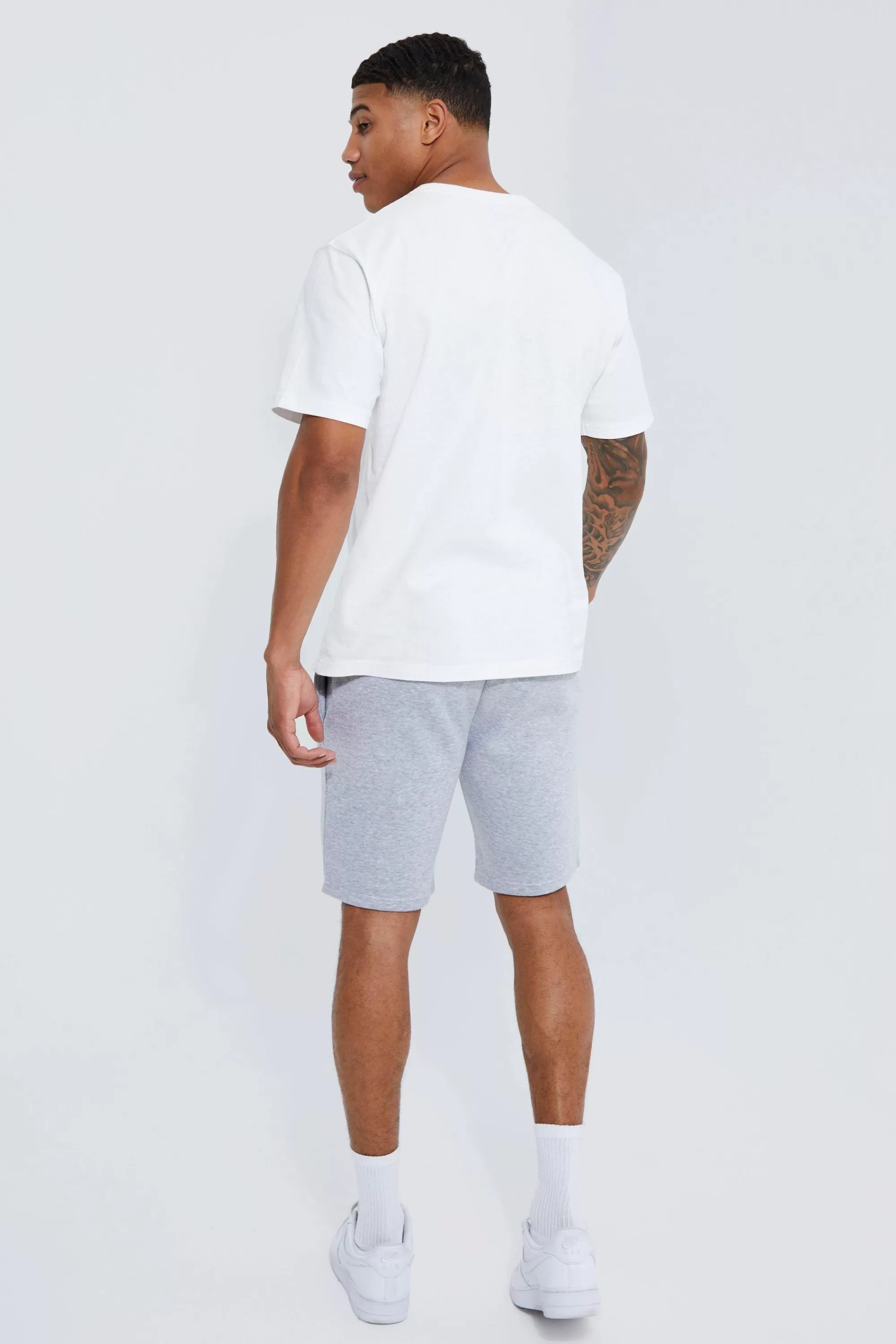 boohooMAN Basic Slim Fit Mid Length Jersey Short | UK
