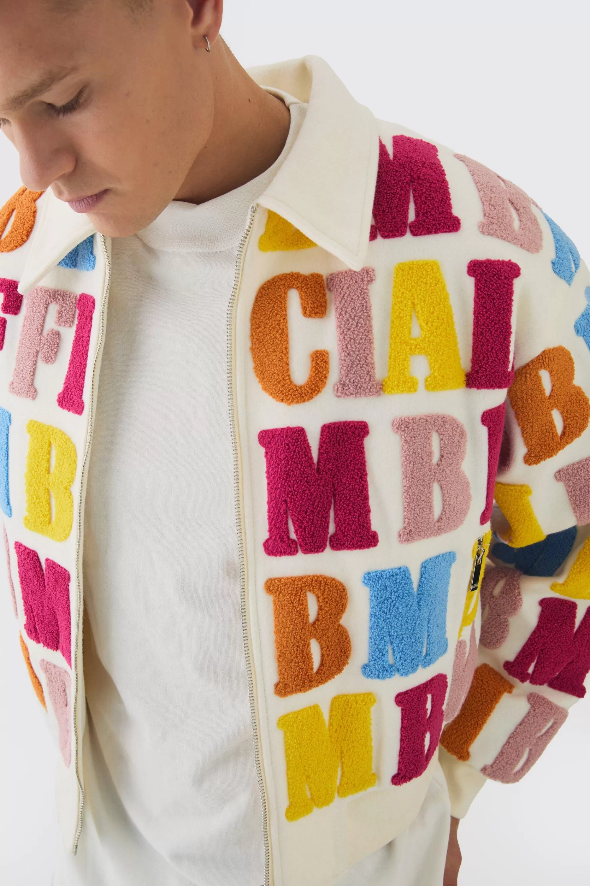 boohooMAN Boxy Letter Badge Collared Varsity Jacket In | UK