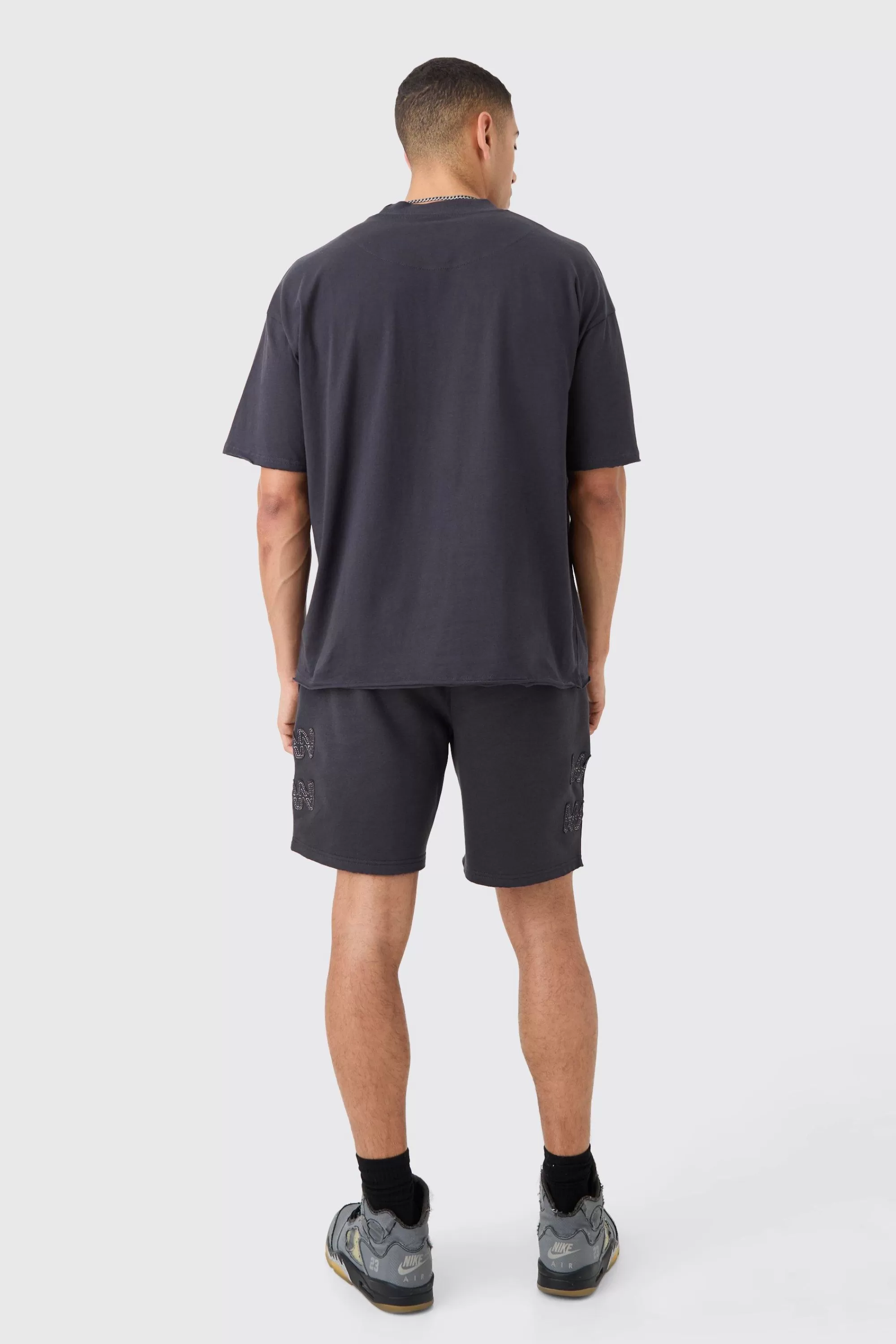 boohooMAN Boxy Man Distressed T-Shirt & Shorts Set | UK
