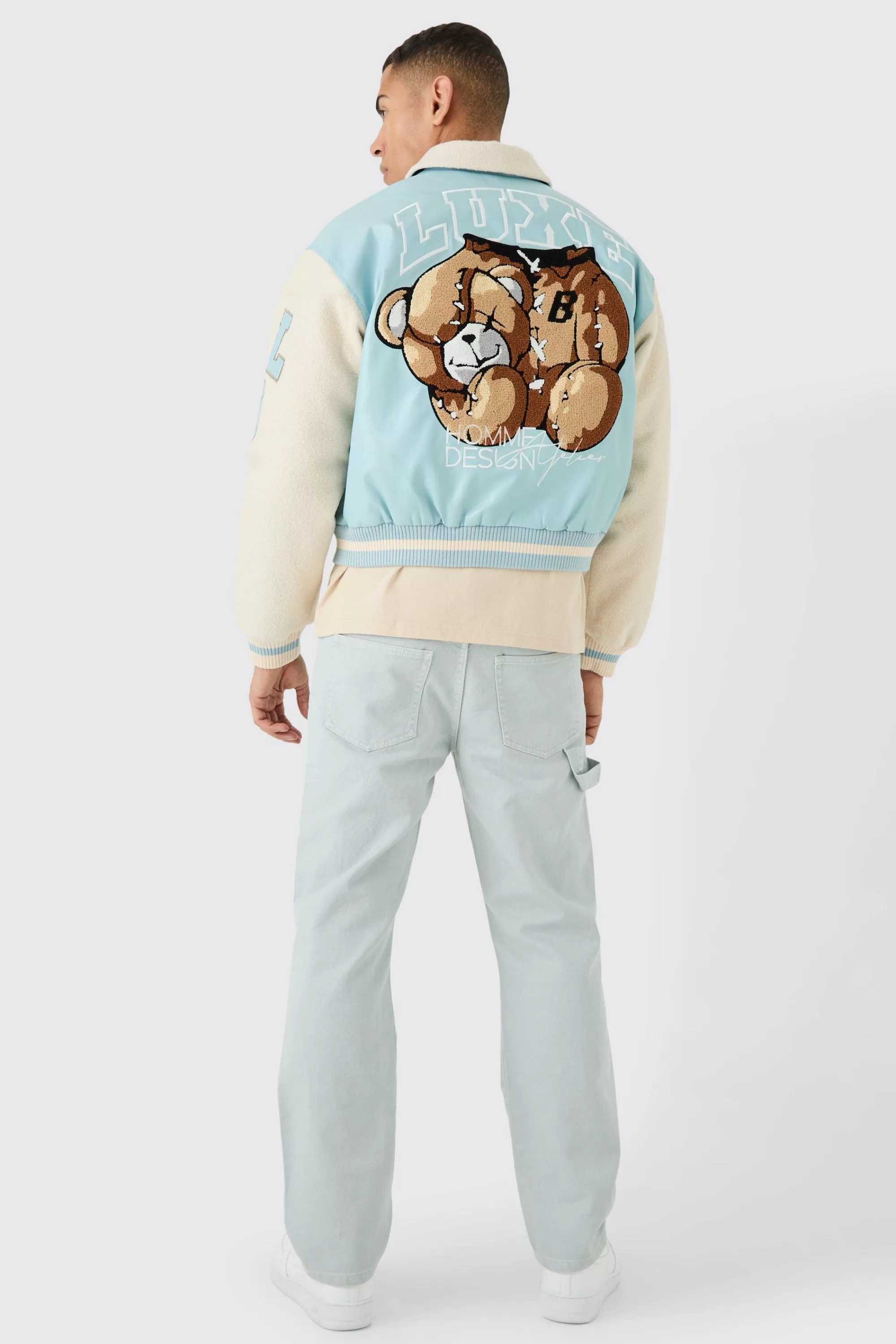 boohooMAN Boxy Teddy Varsity Jacket With Boucle Sleeves | UK