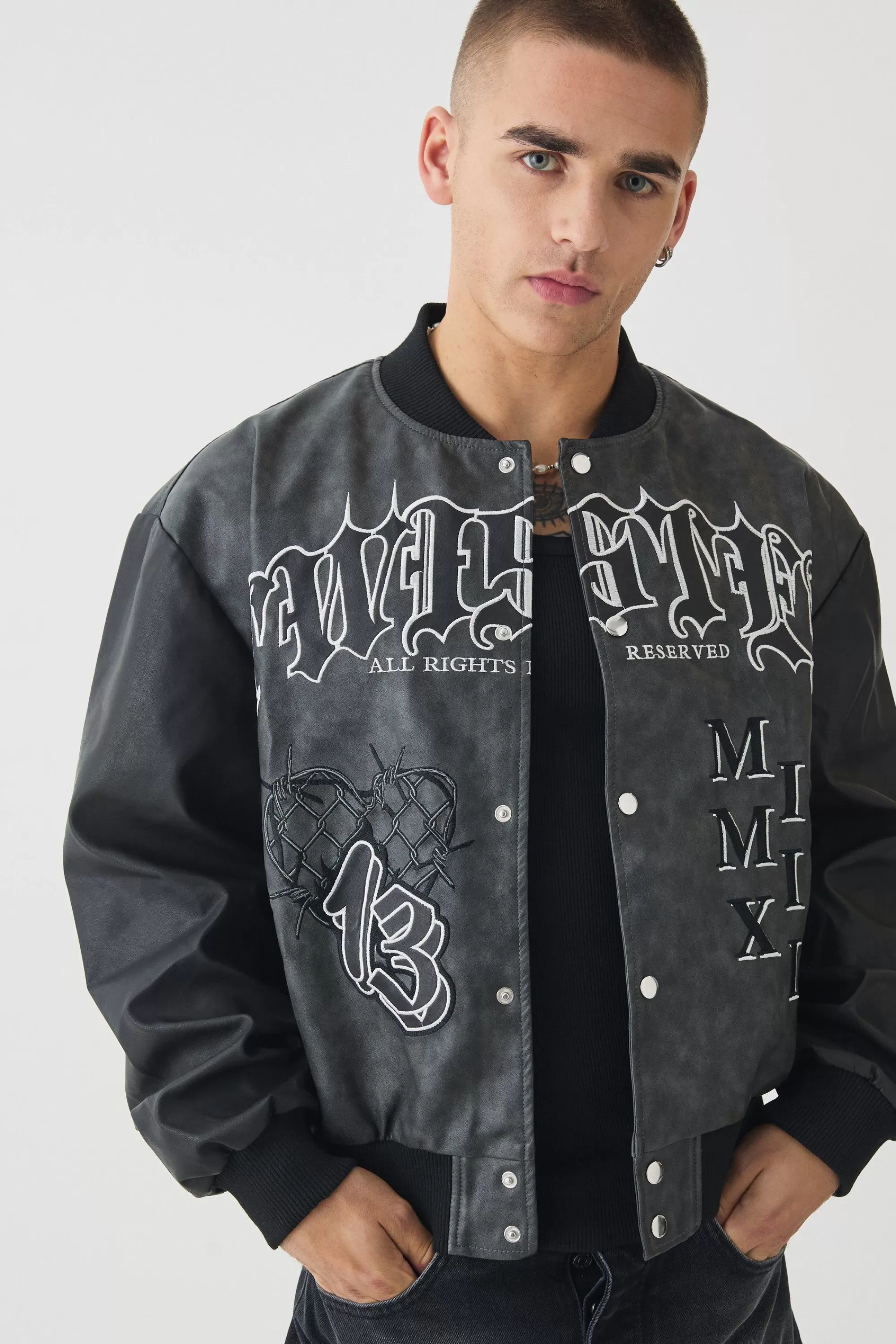 boohooMAN Boxy Tonal Badge Tumbled Pu Varsity Jacket In | UK