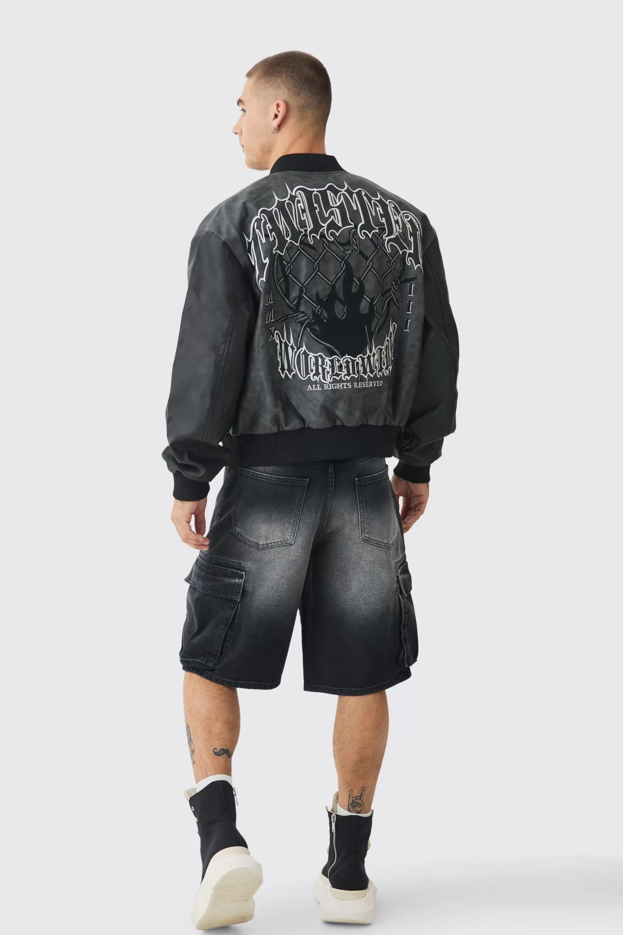 boohooMAN Boxy Tonal Badge Tumbled Pu Varsity Jacket In | UK