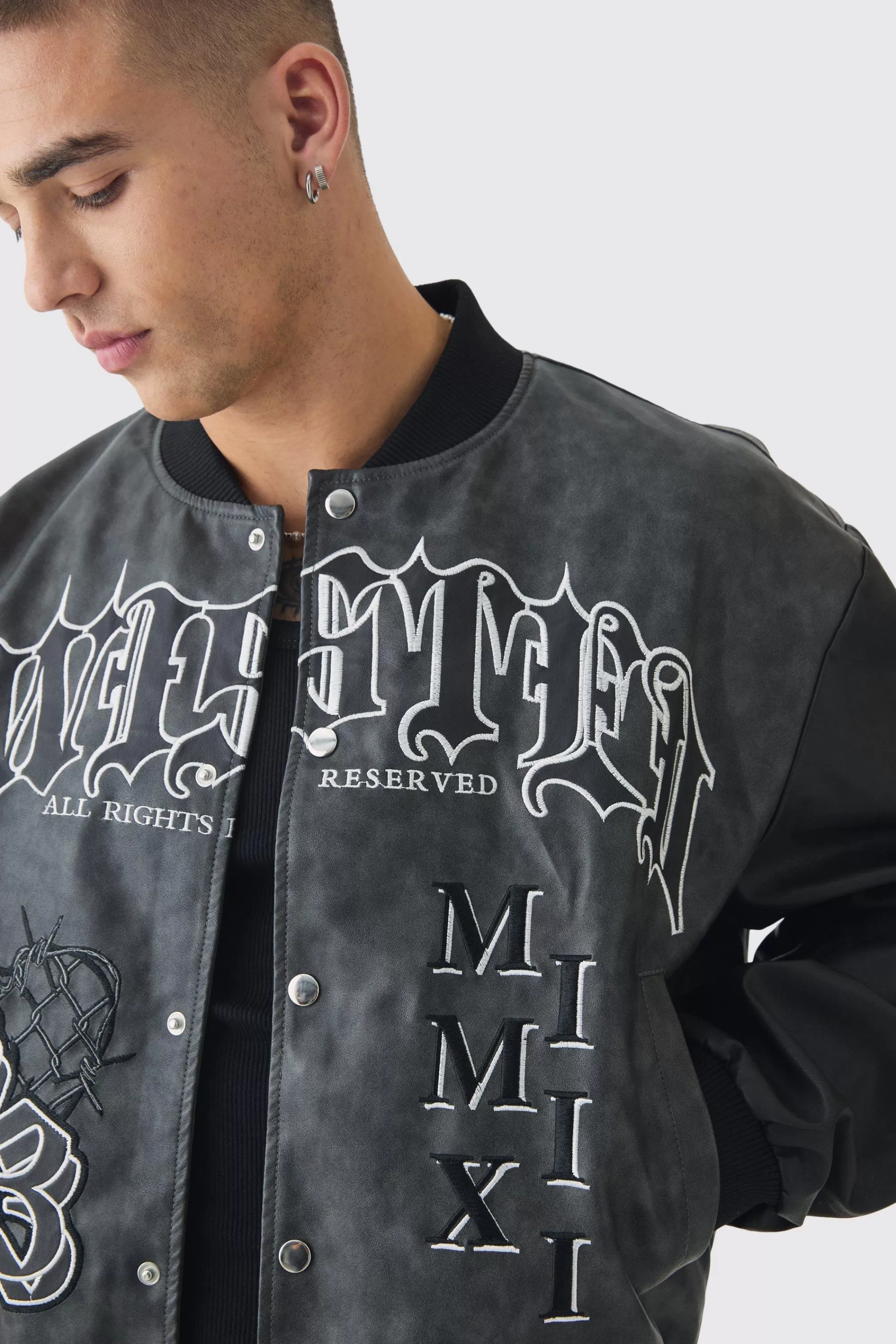 boohooMAN Boxy Tonal Badge Tumbled Pu Varsity Jacket In | UK