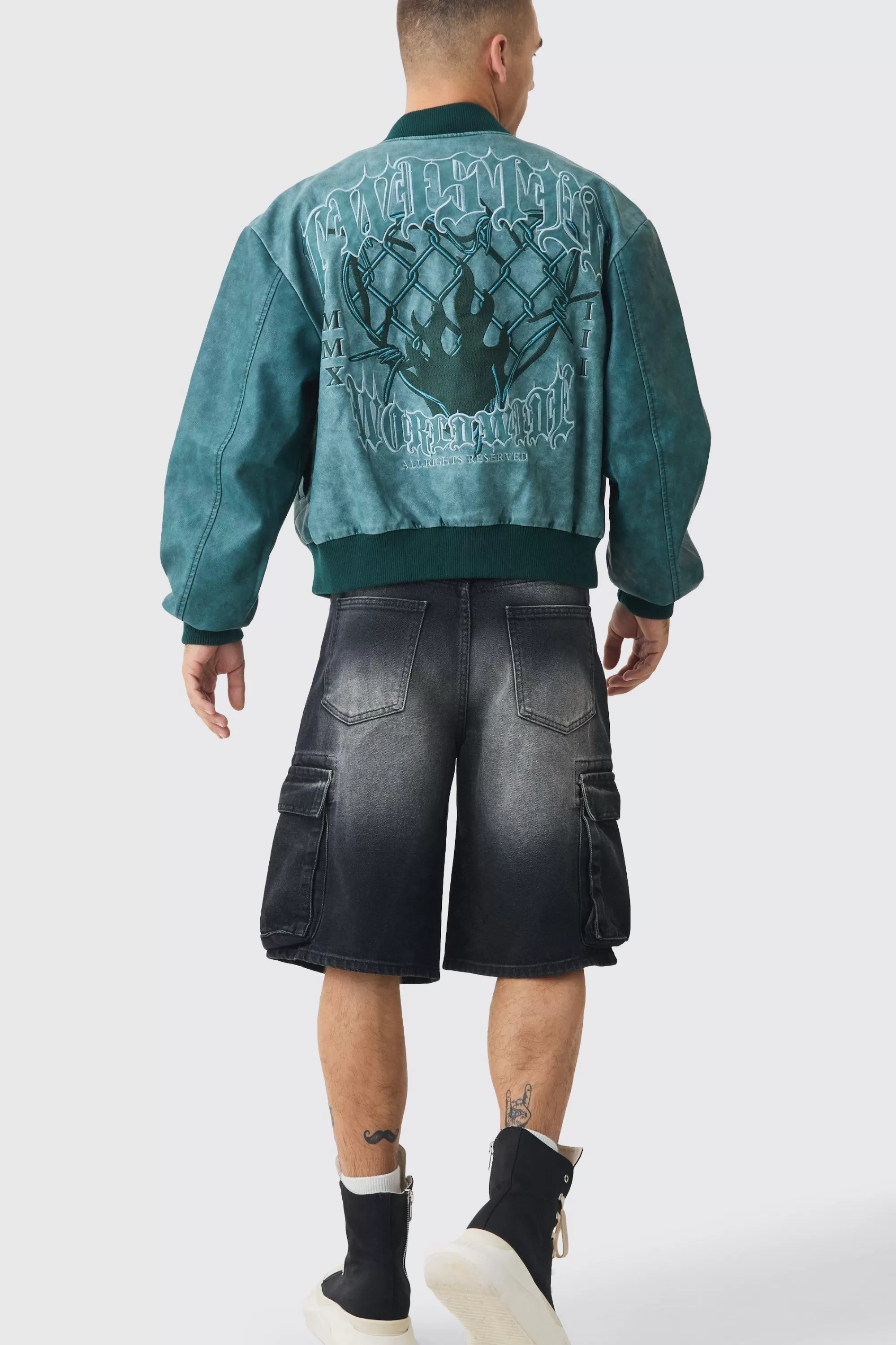 boohooMAN Boxy Tonal Badge Tumbled Pu Varsity Jacket In | UK
