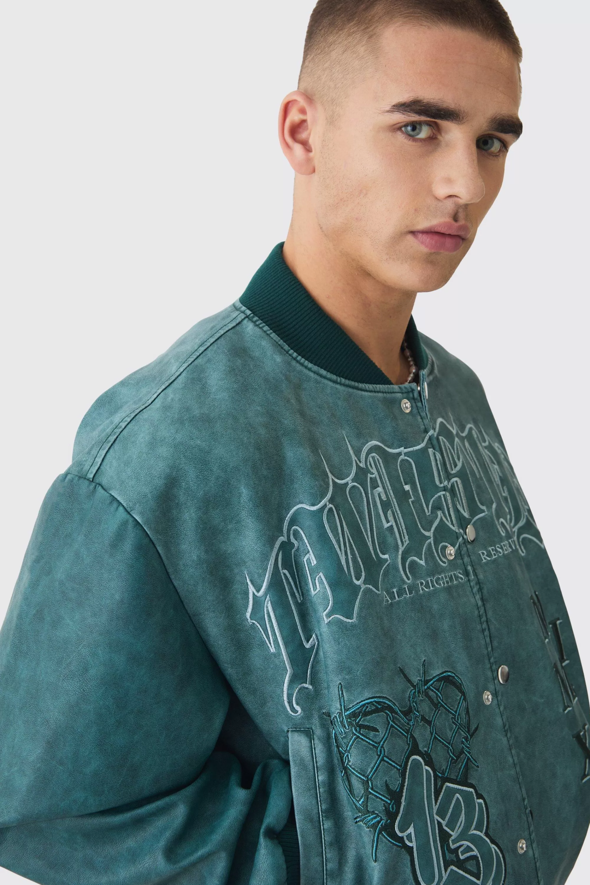 boohooMAN Boxy Tonal Badge Tumbled Pu Varsity Jacket In | UK
