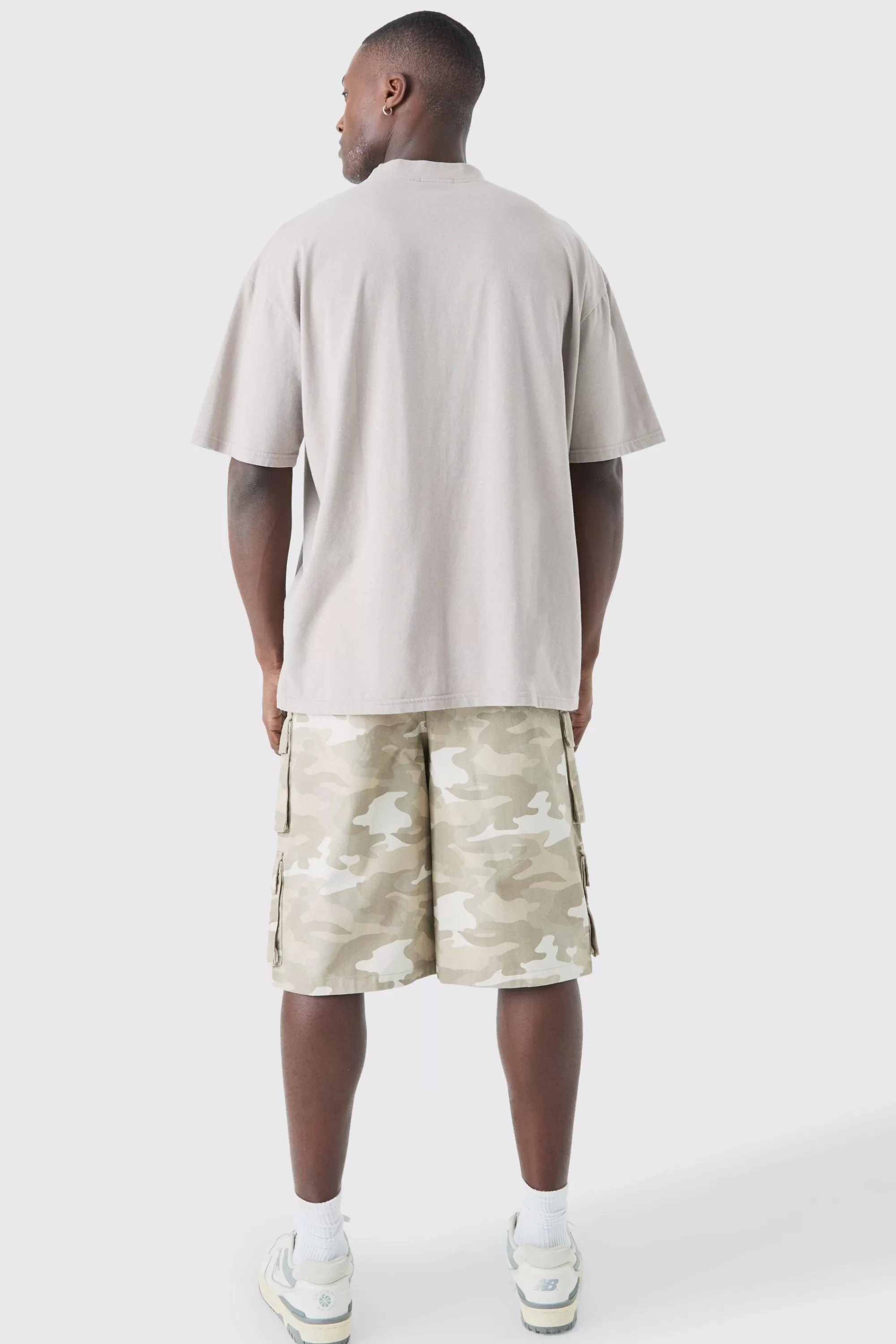 boohooMAN Camo Fixed Waist Multi Cargo Pocket Jorts | UK
