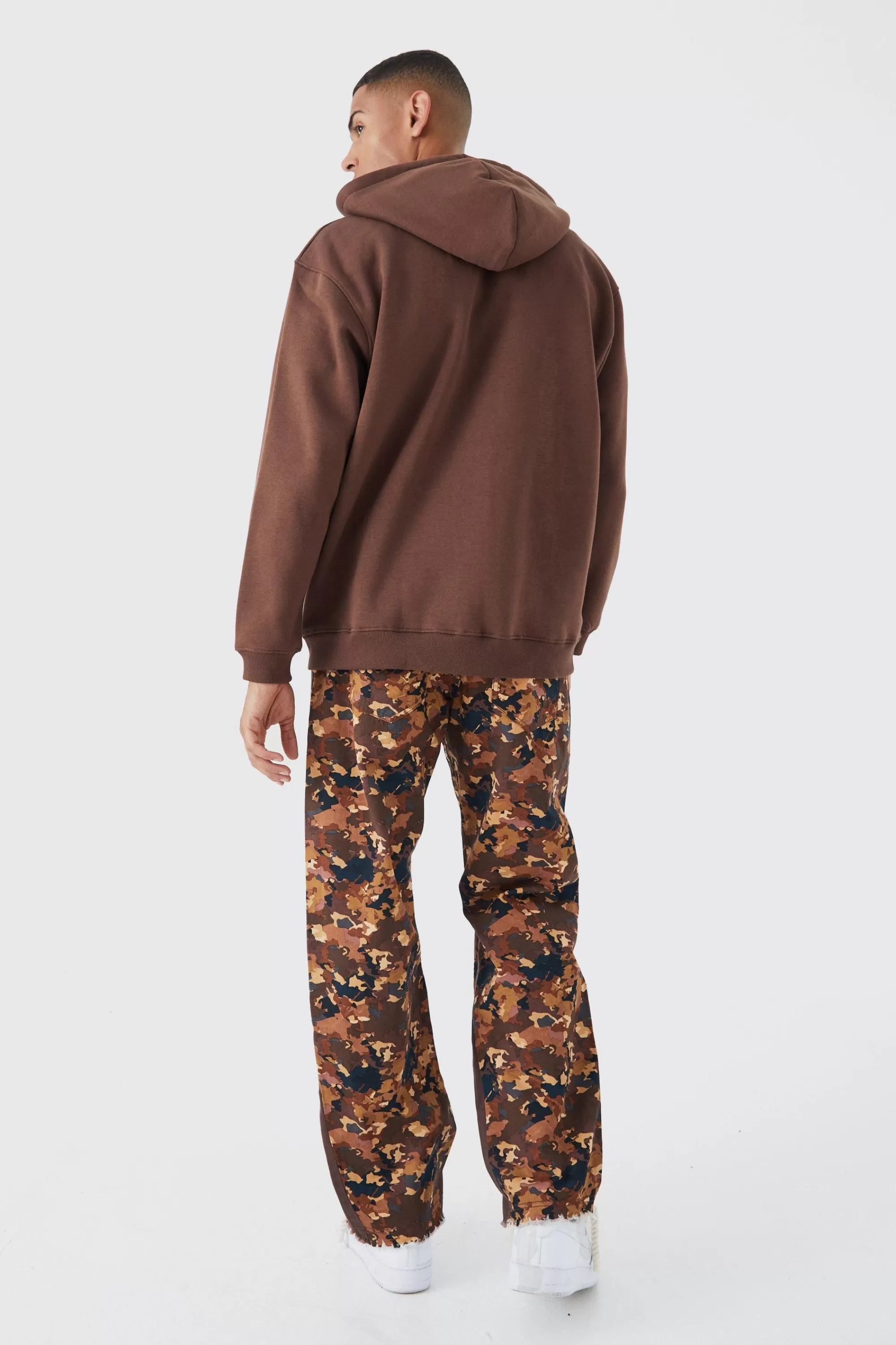 boohooMAN Camo Gusset Detail Official Applique Flared Trousers | UK