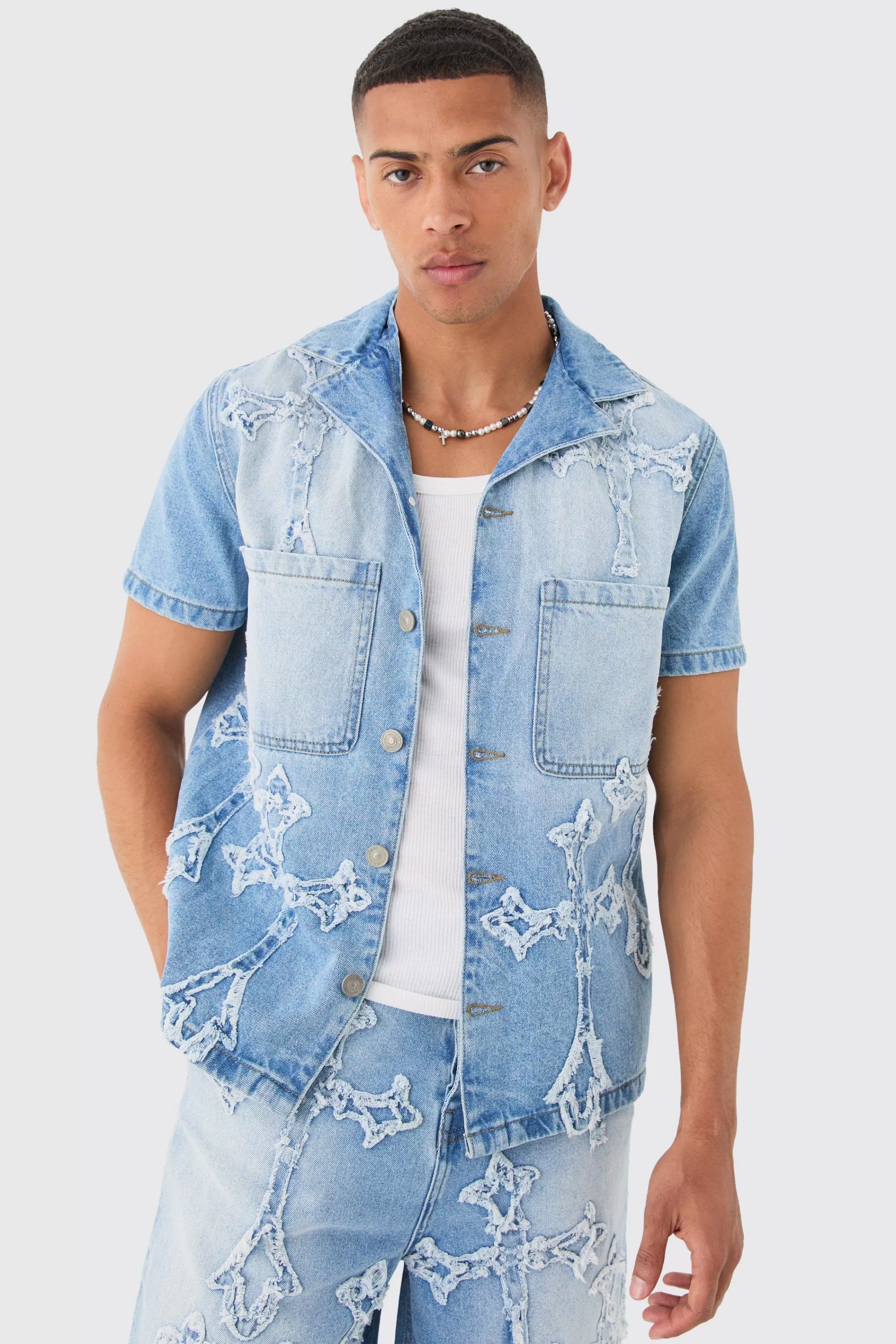 boohooMAN Distressed Cross Applique Denim Revere Shirt In | UK