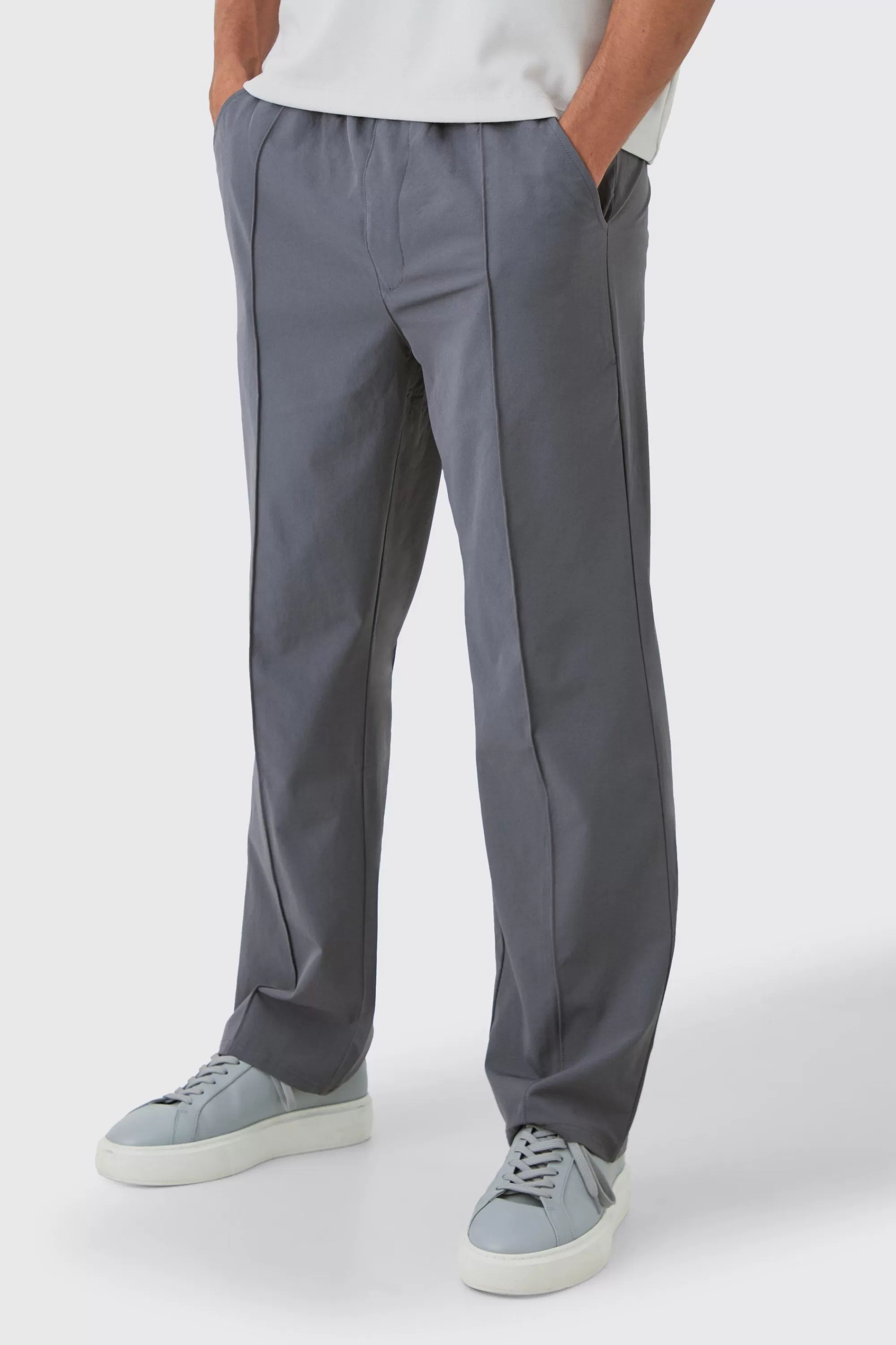 boohooMAN Elasticated Technical Stretch Relaxed Pintuck Trouser | UK