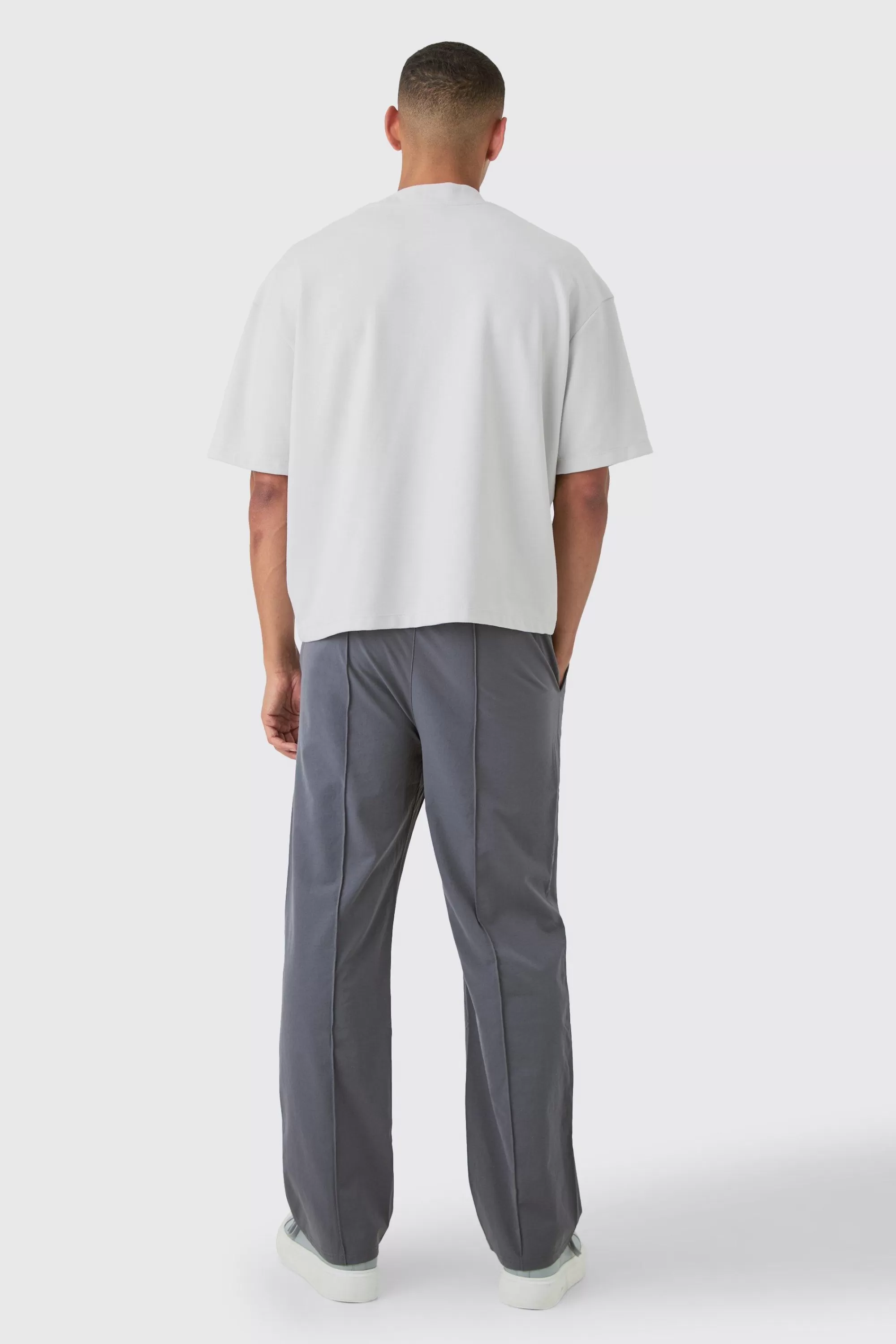 boohooMAN Elasticated Technical Stretch Relaxed Pintuck Trouser | UK