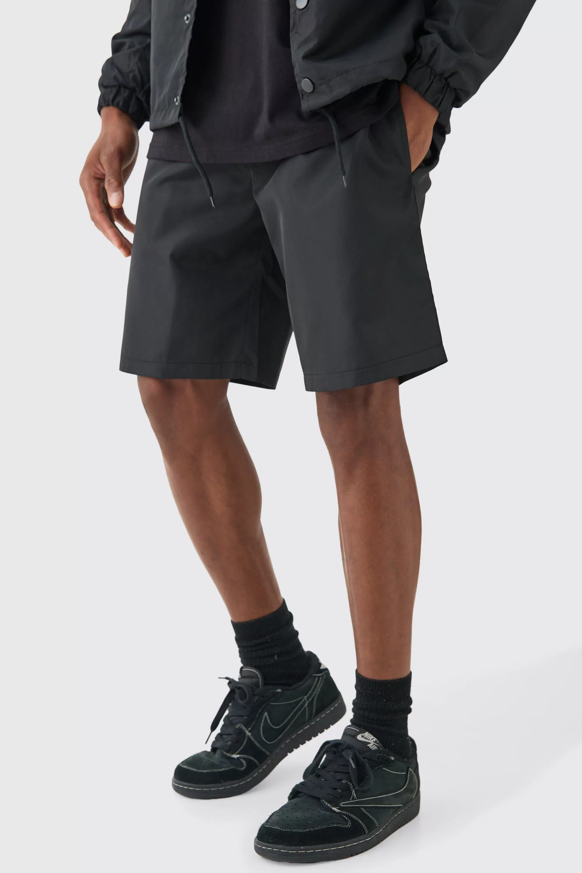 boohooMAN Elasticated Waist Comfort Nylon Shorts | UK