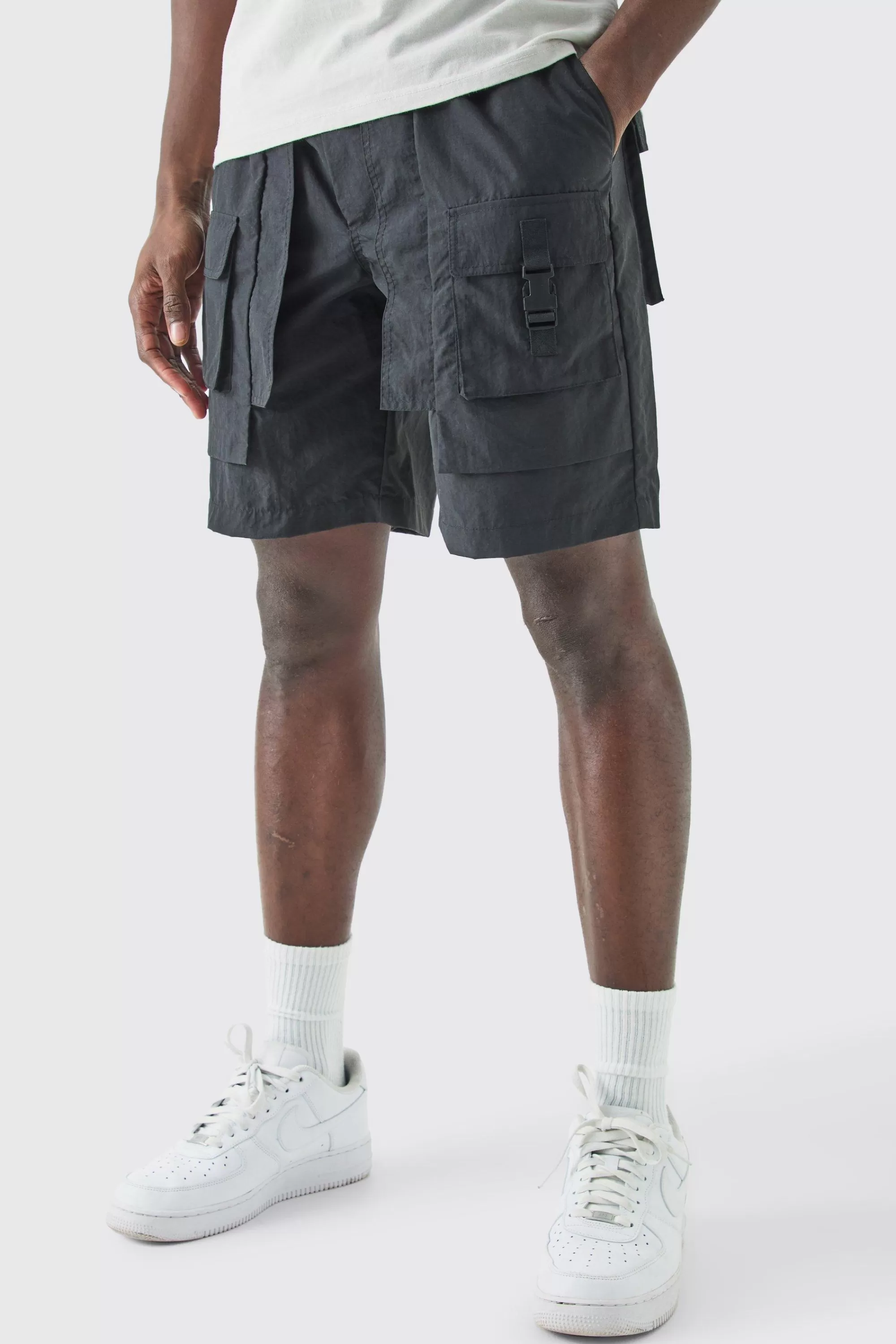 boohooMAN Elasticated Waist Crinkle Nylon Buckle Cargo Short | UK