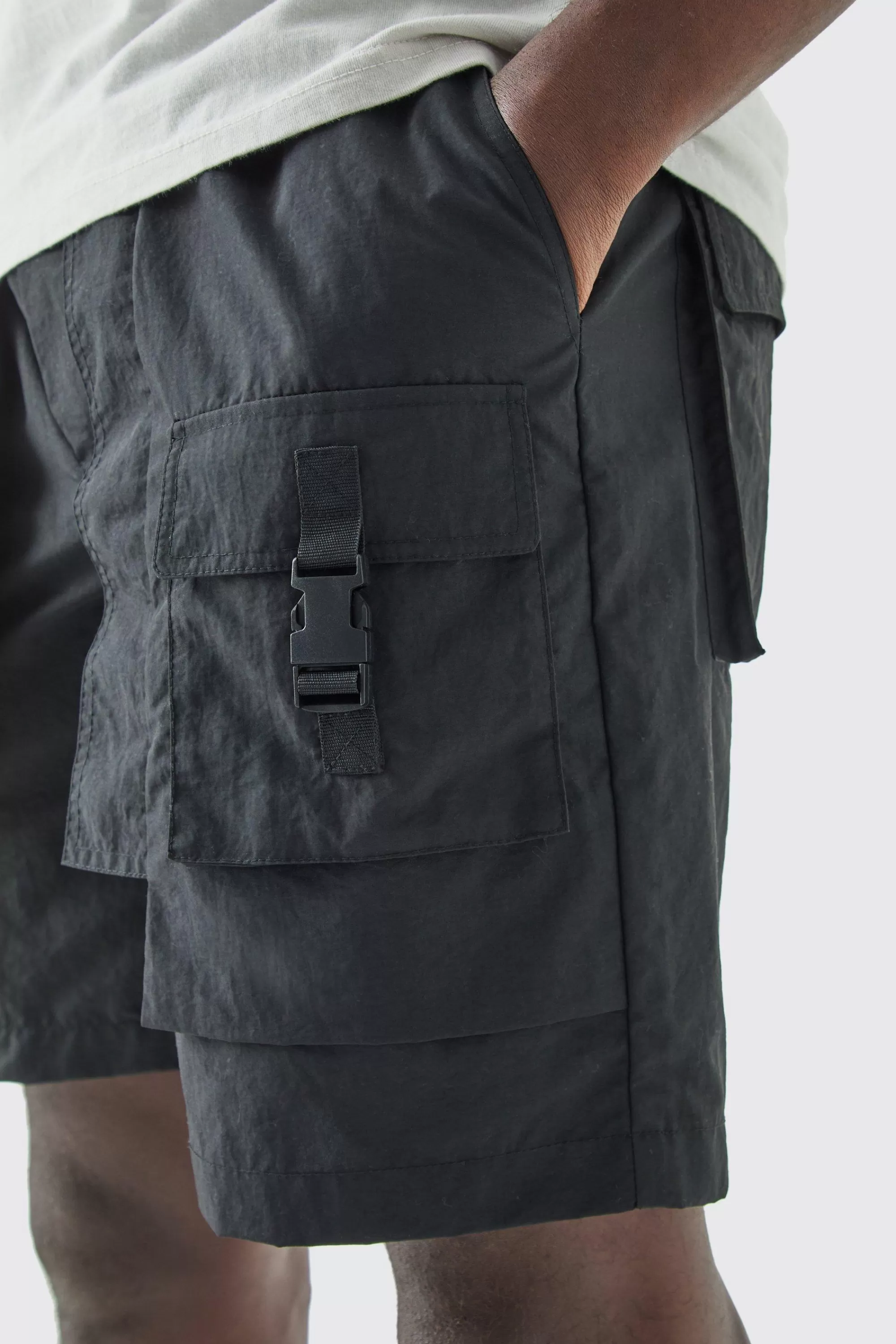 boohooMAN Elasticated Waist Crinkle Nylon Buckle Cargo Short | UK