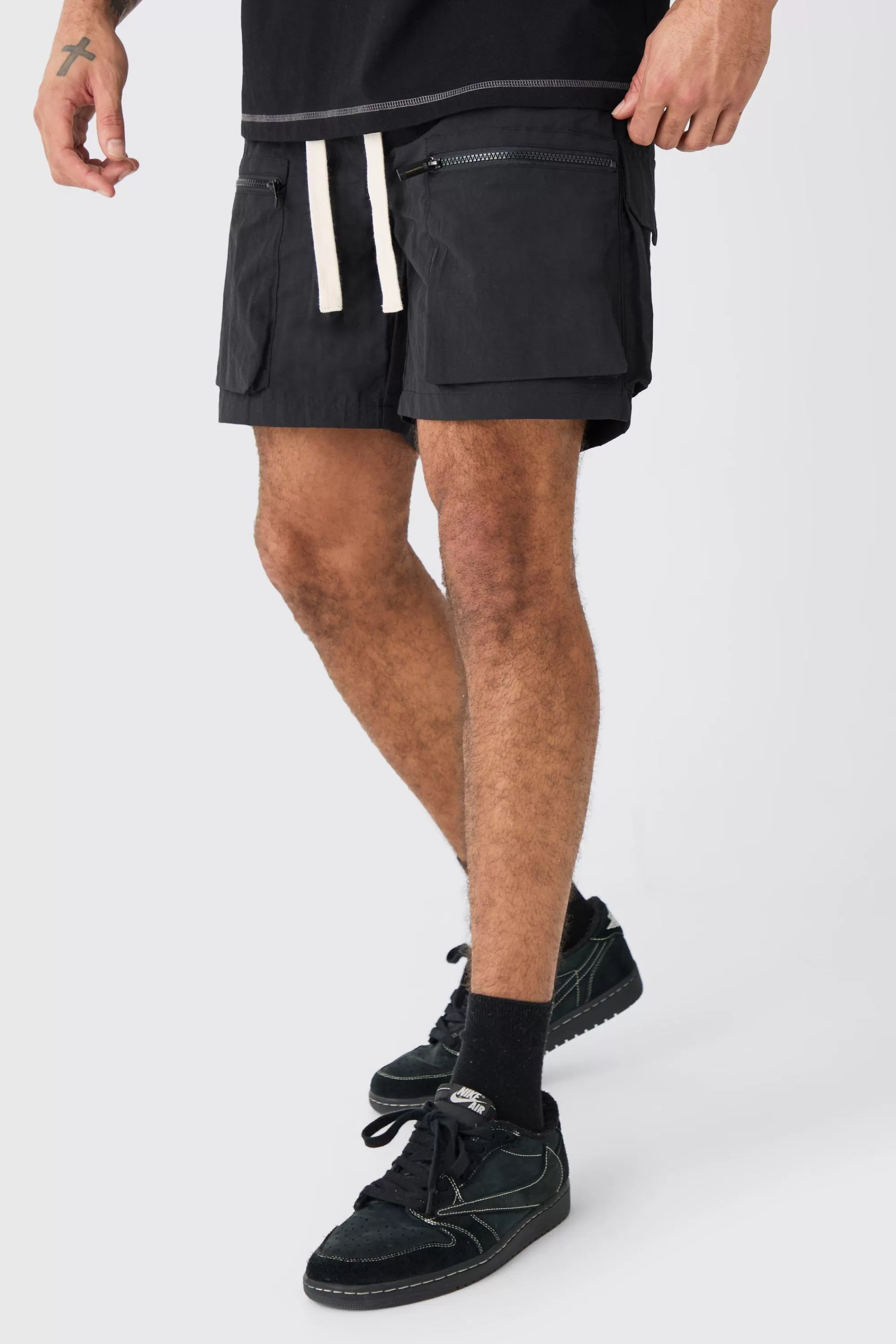 boohooMAN Elasticated Waist Crinkle Nylon Zip Cargo Short | UK
