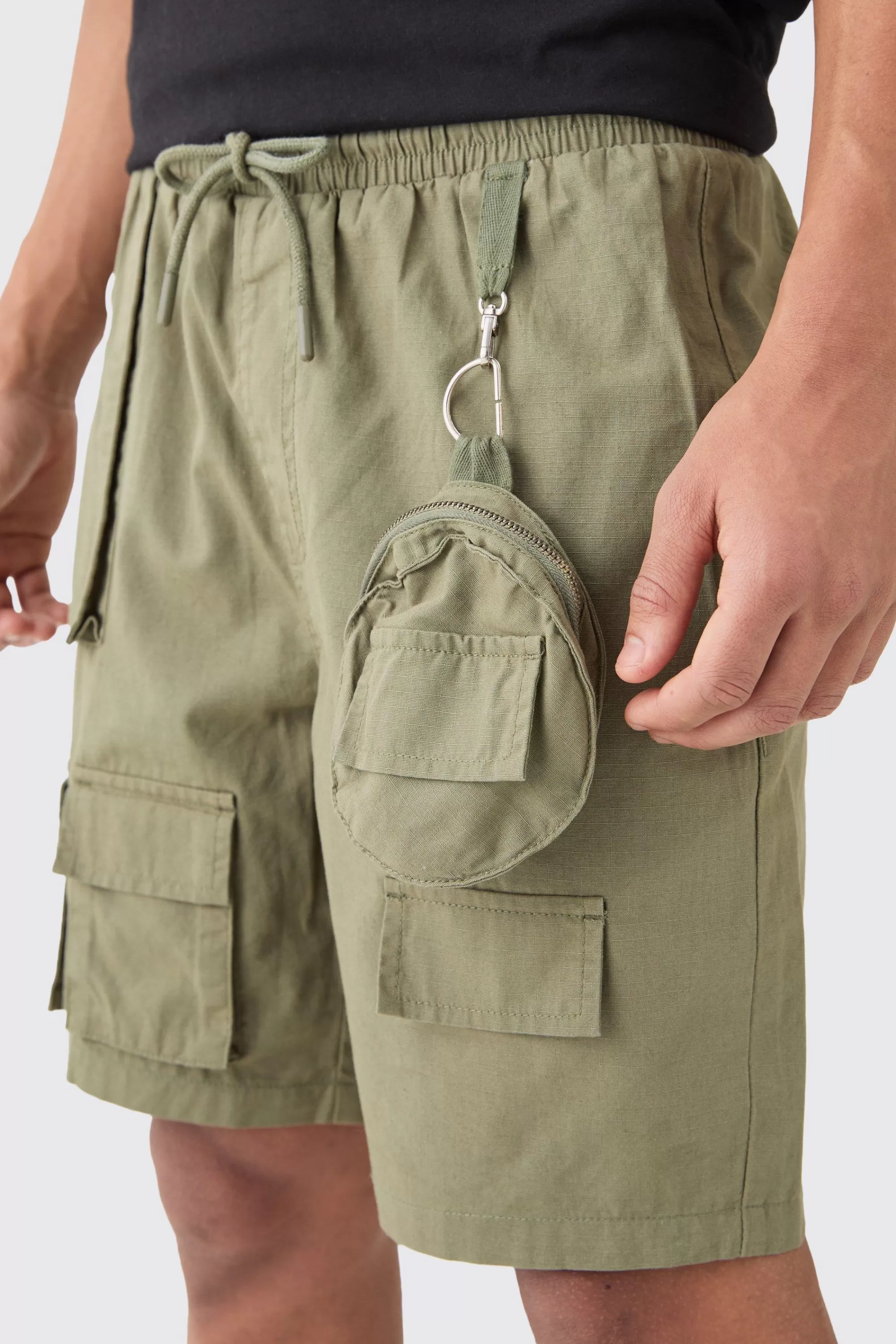 boohooMAN Elasticated Waist Detachable Bag Multi Cargo Pocket Shorts | UK