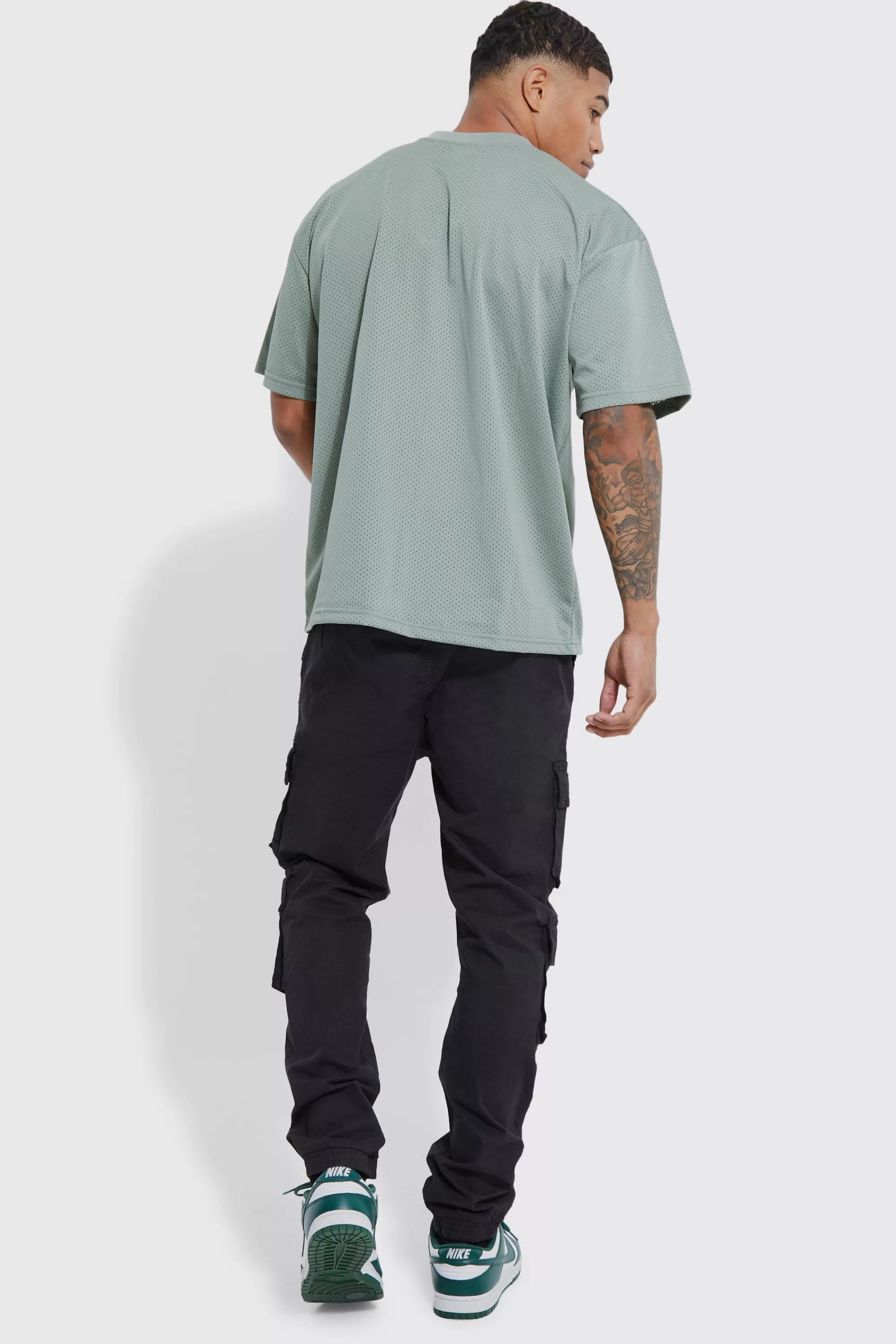 boohooMAN Elasticated Waist Multi Cargo Pocket Slim Fit Jogger | UK