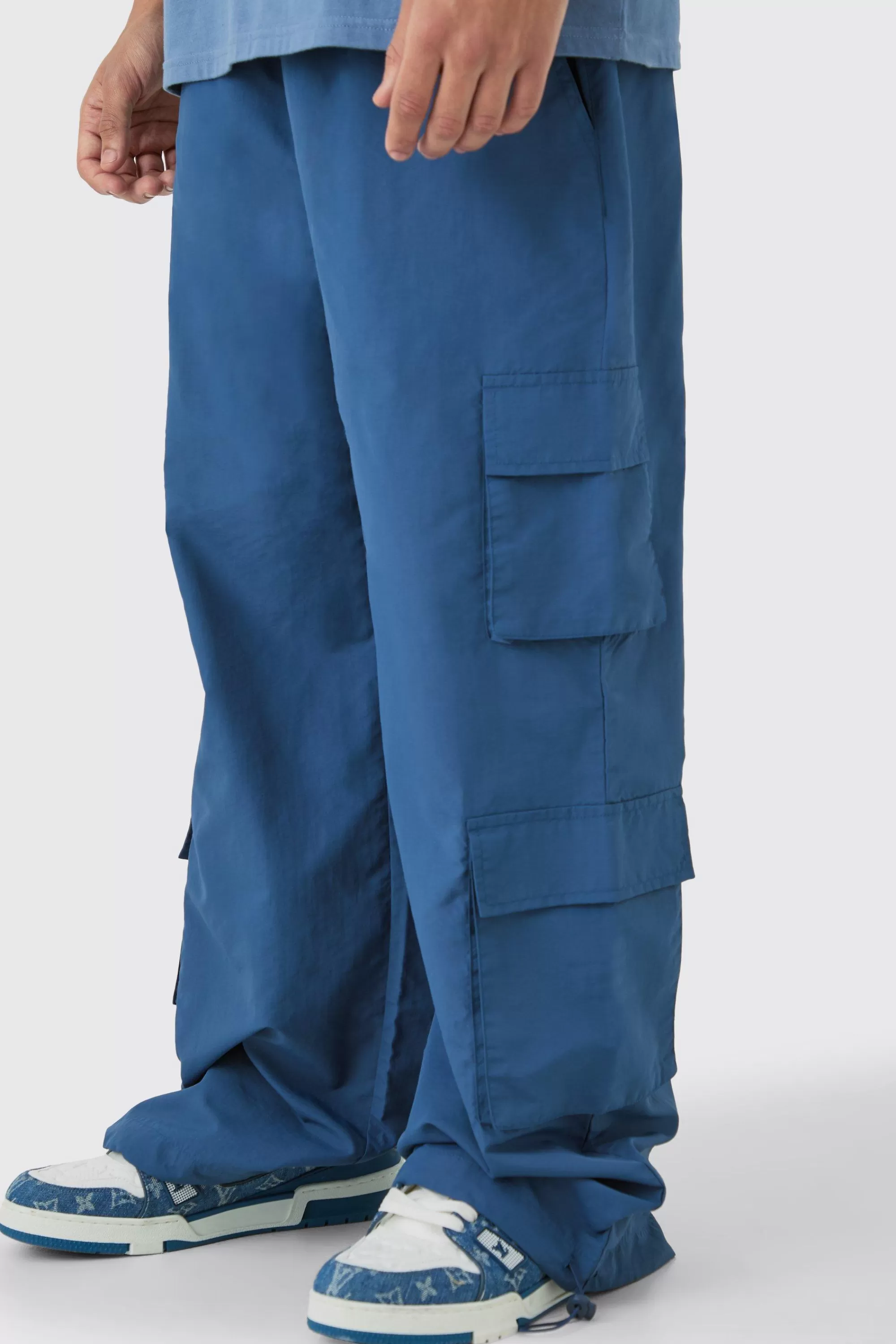 boohooMAN Elasticated Waist Multi Pocket Parachute Trousers | UK