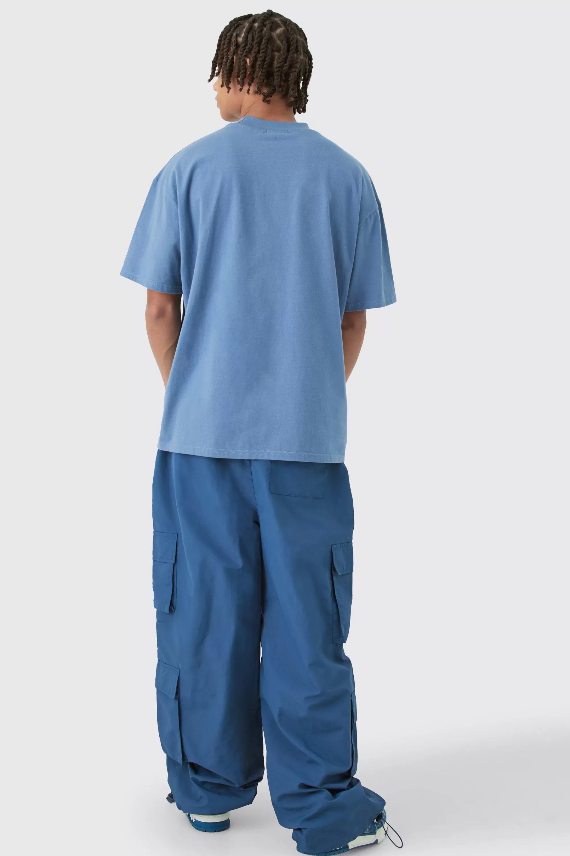boohooMAN Elasticated Waist Multi Pocket Parachute Trousers | UK