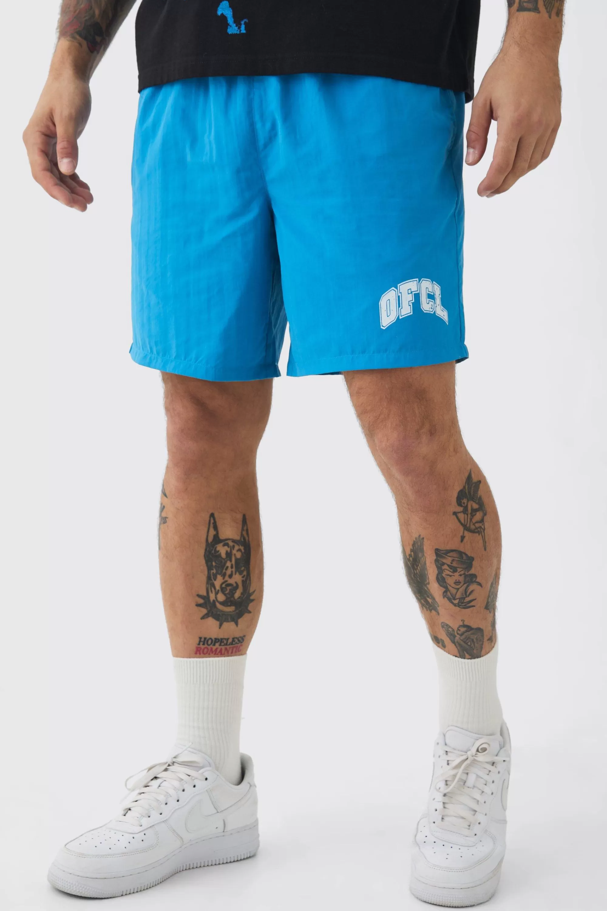 boohooMAN Elasticated Waist OFCL Shell Shorts In | UK