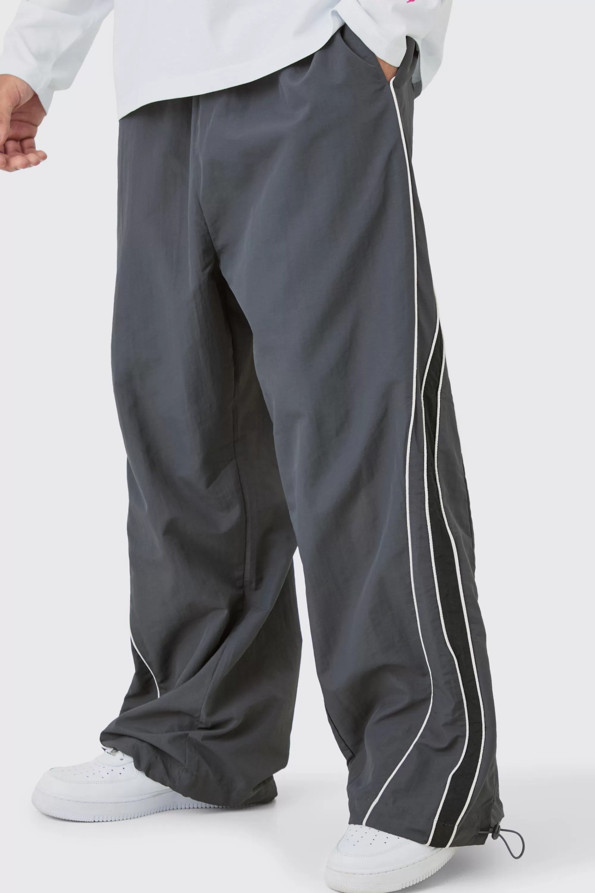 boohooMAN Elasticated Waist Piping Detail Parachute Pants | UK