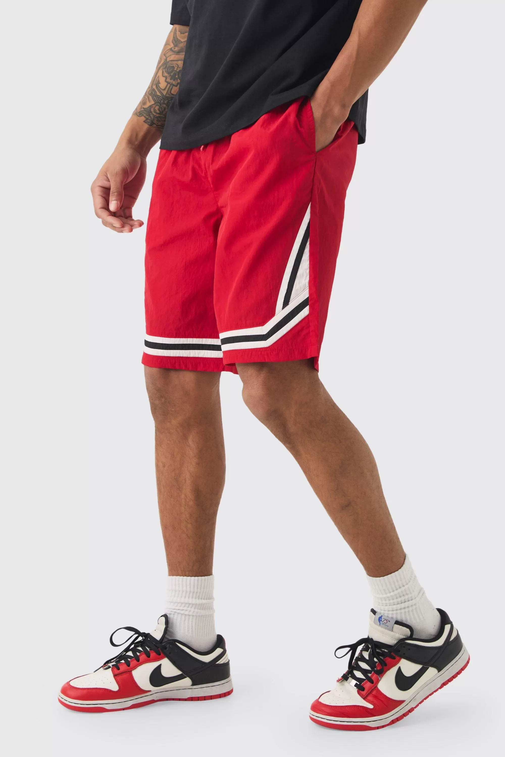 boohooMAN Elasticated Waist Piping Detail Shell Shorts In | UK