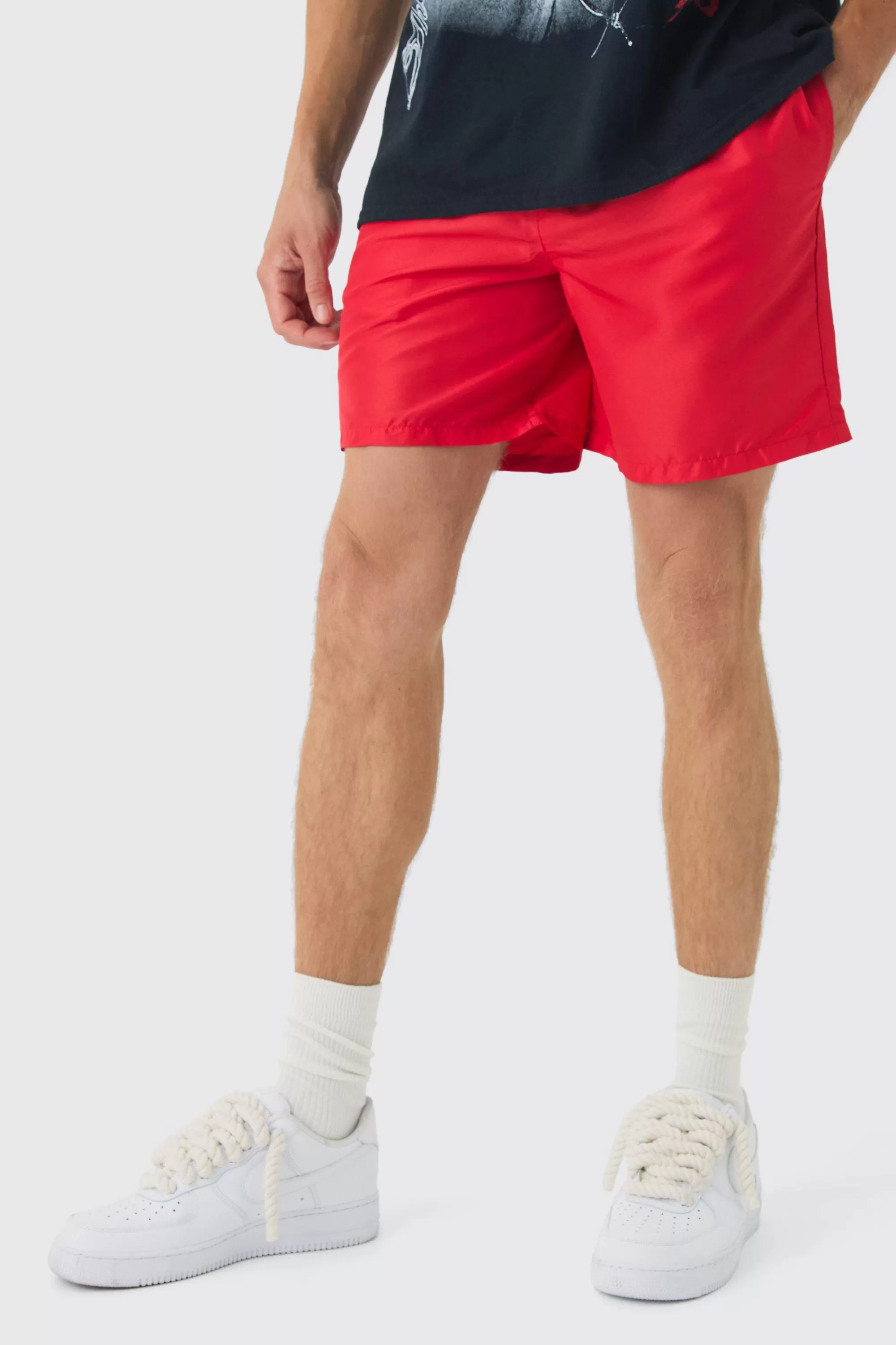 boohooMAN Elasticated Waist Relaxed Contrast Drawcord Shell Short Shorts | UK