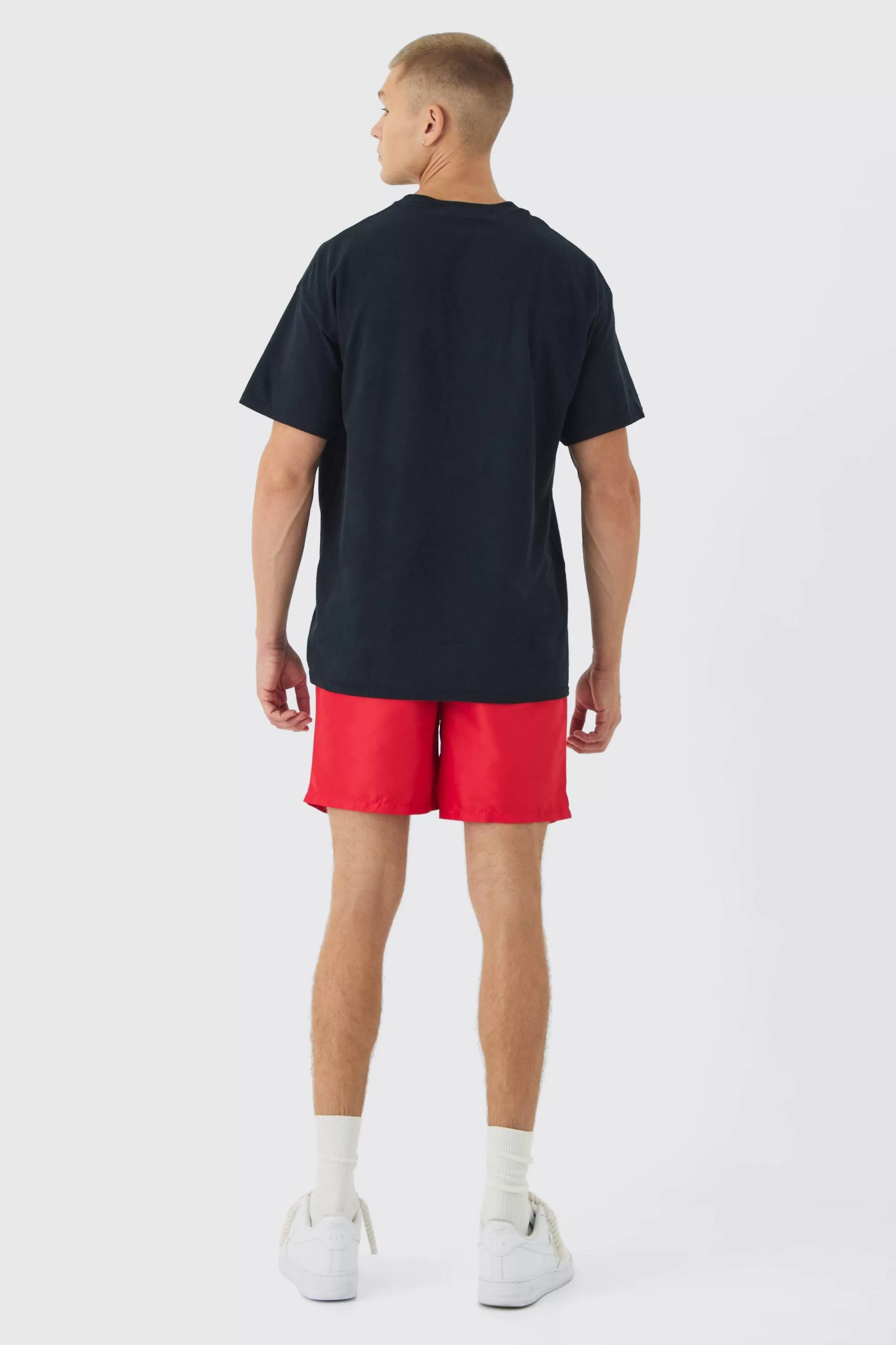 boohooMAN Elasticated Waist Relaxed Contrast Drawcord Shell Short Shorts | UK
