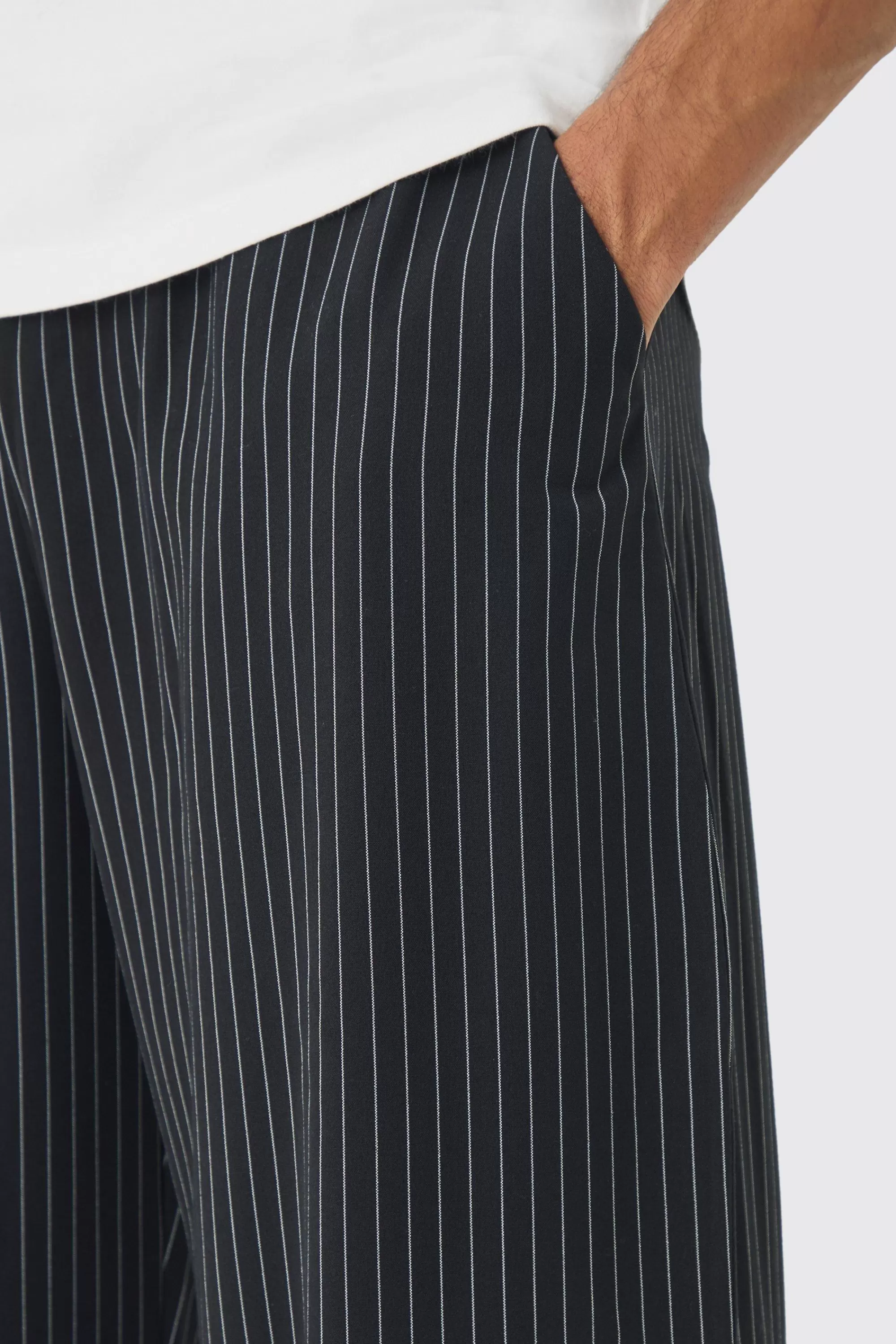 boohooMAN Elasticated Waist Relaxed Pinstripe Turn Up Hem Trousers | UK