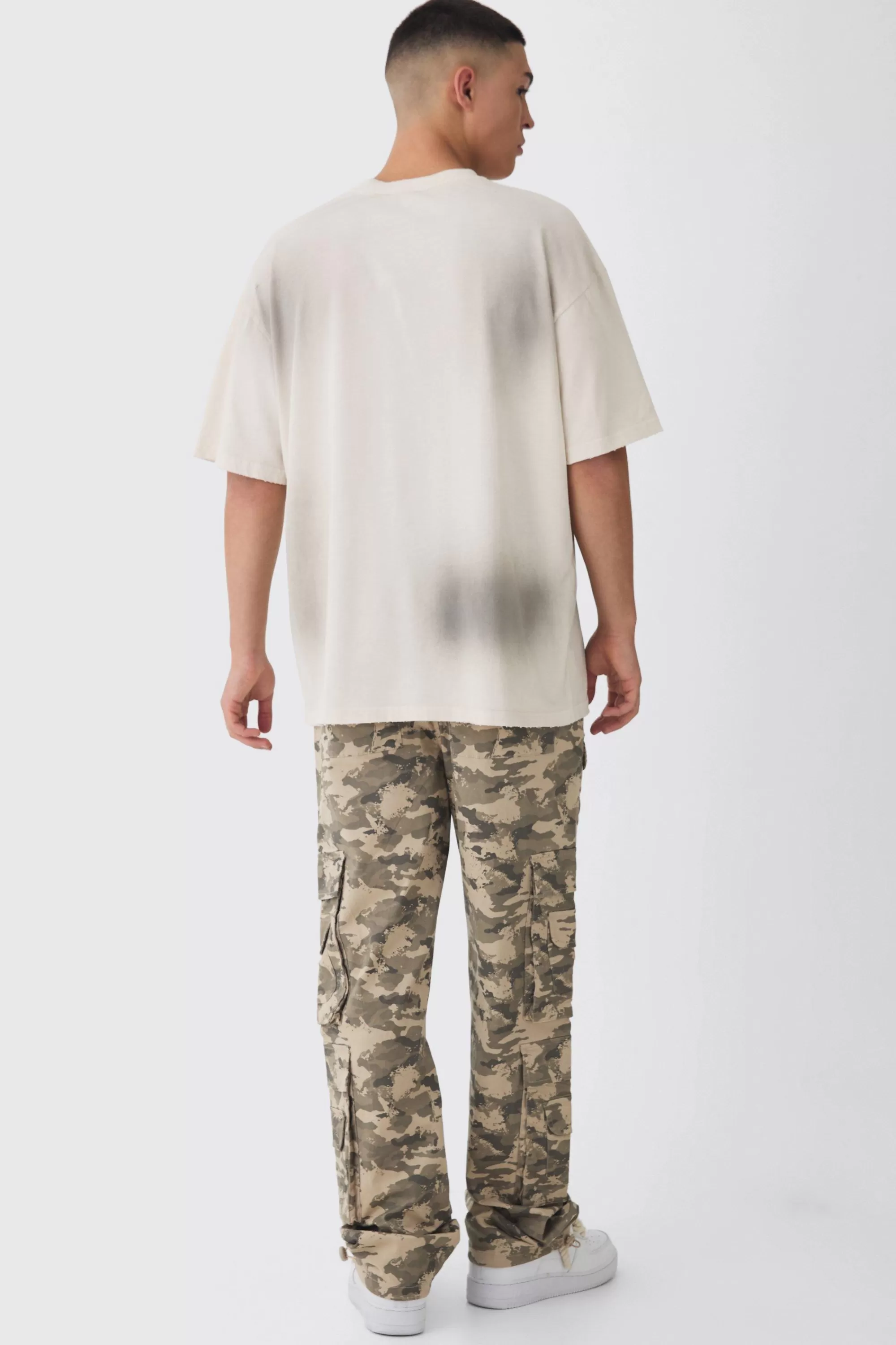 boohooMAN Elasticated Waist Relaxed Stacked Camo Cargo Trousers | UK