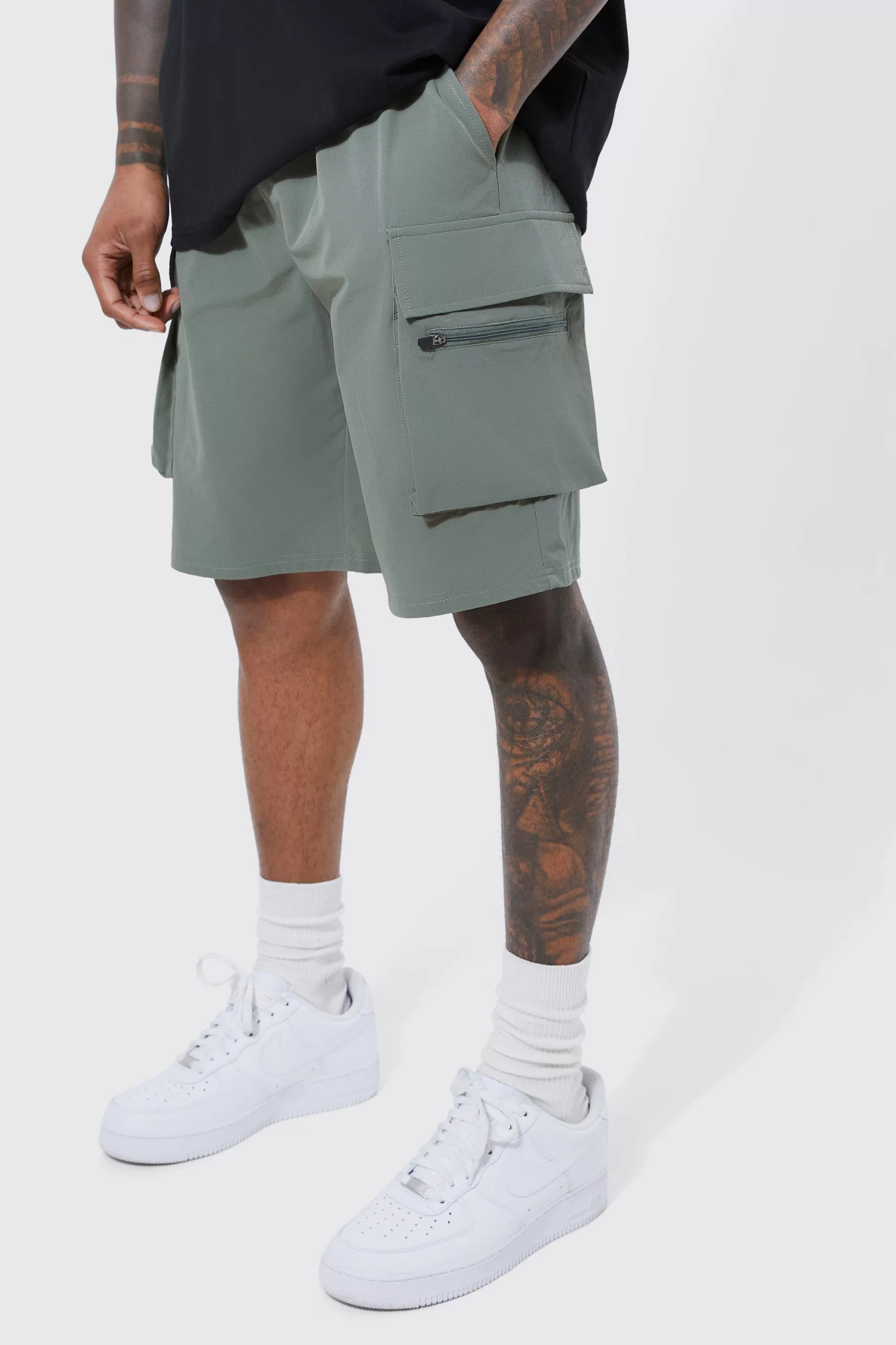 boohooMAN Elasticated Waist Relaxed Technical Stretch Cargo Short | UK