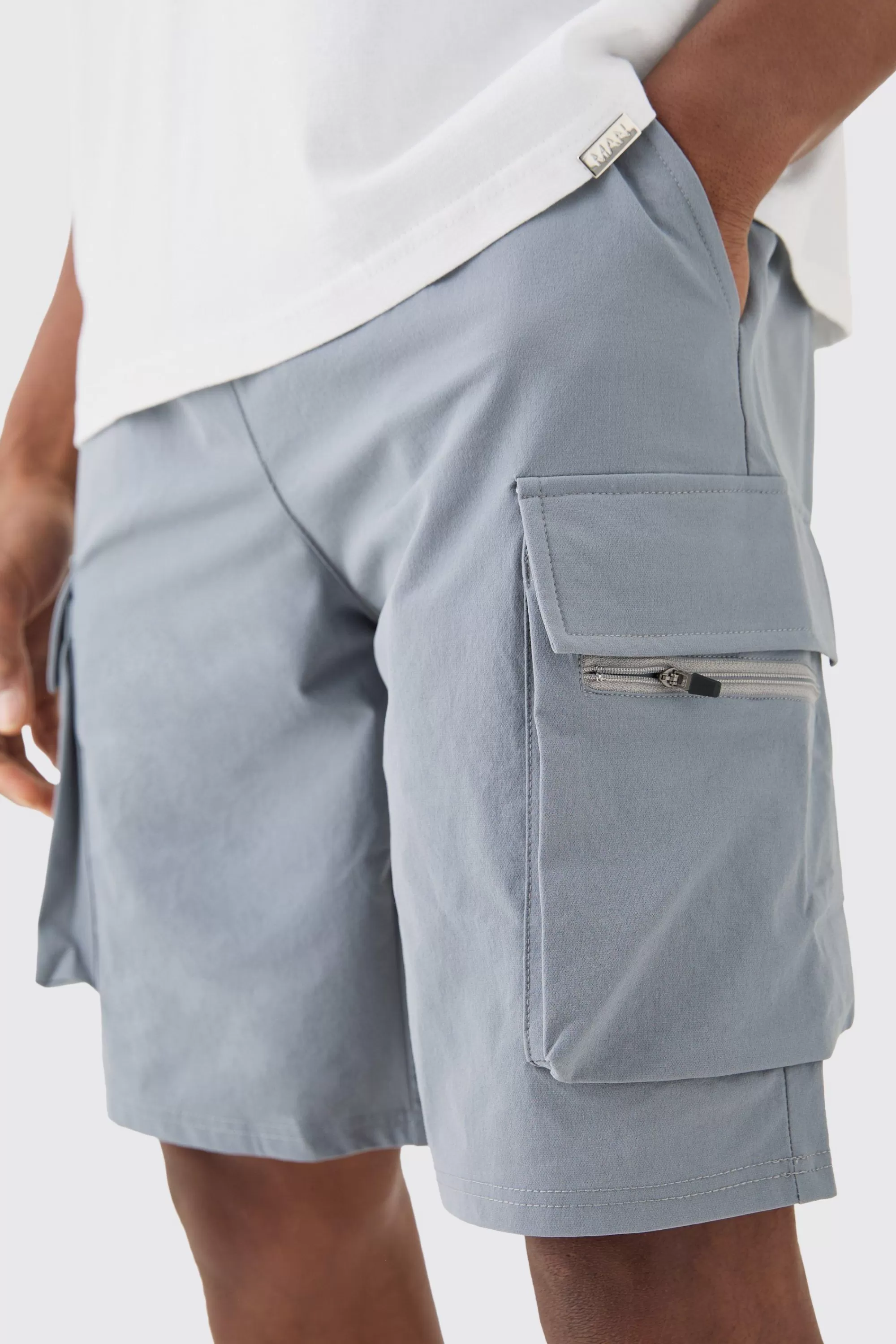 boohooMAN Elasticated Waist Relaxed Technical Stretch Cargo Short | UK