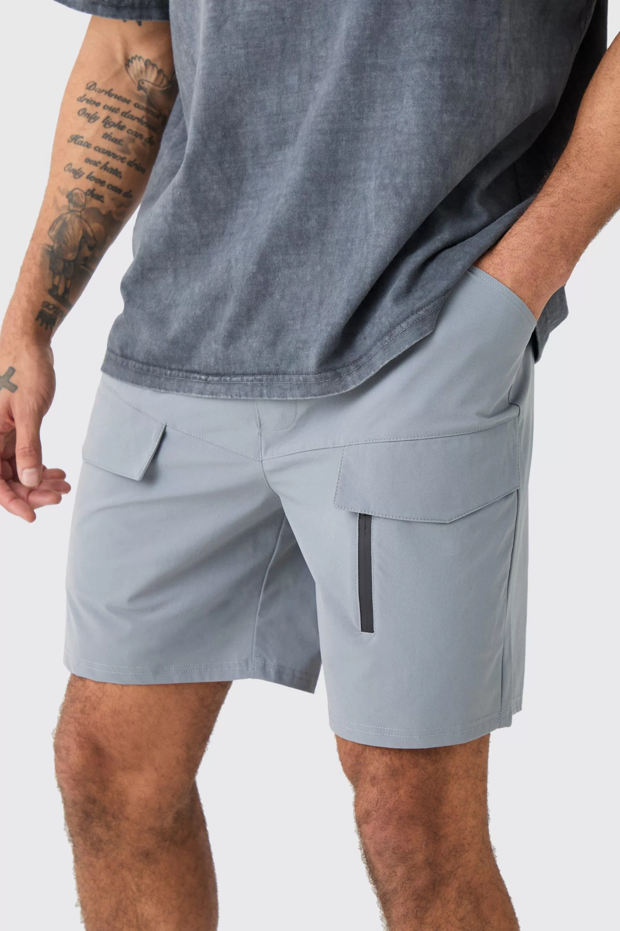 boohooMAN Elasticated Waist Relaxed Technical Stretch Cargo With Zip | UK