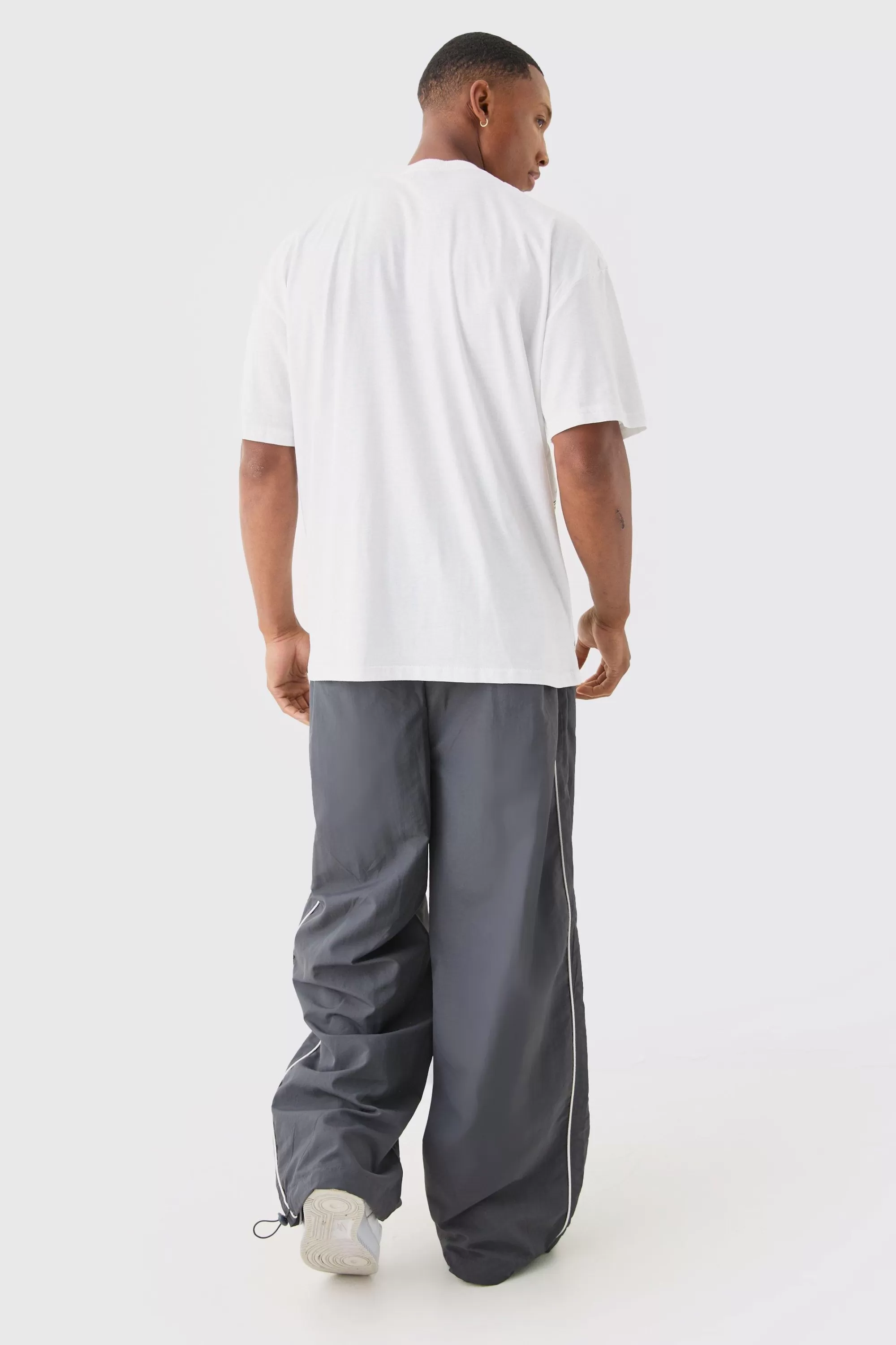 boohooMAN Elasticated Waist Side Stripe Parachute Pants | UK