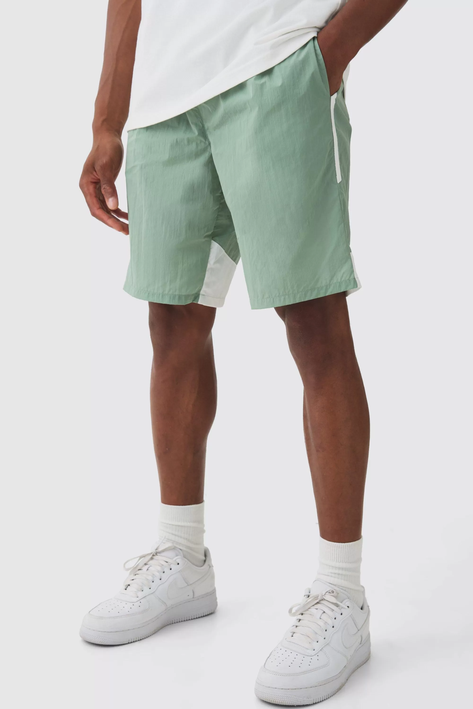 boohooMAN Elasticated Waist Side Stripe Shell Shorts In | UK