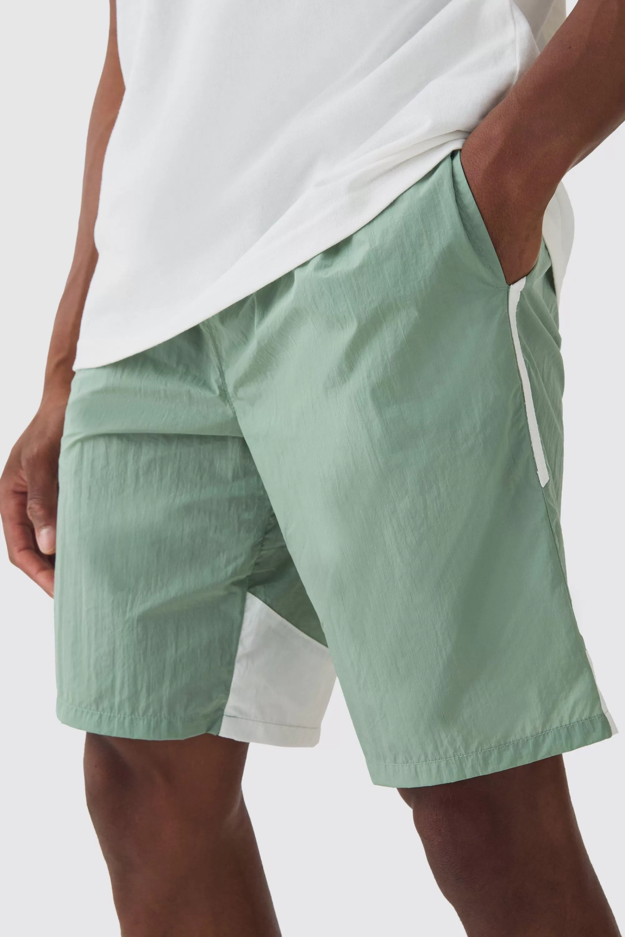 boohooMAN Elasticated Waist Side Stripe Shell Shorts In | UK