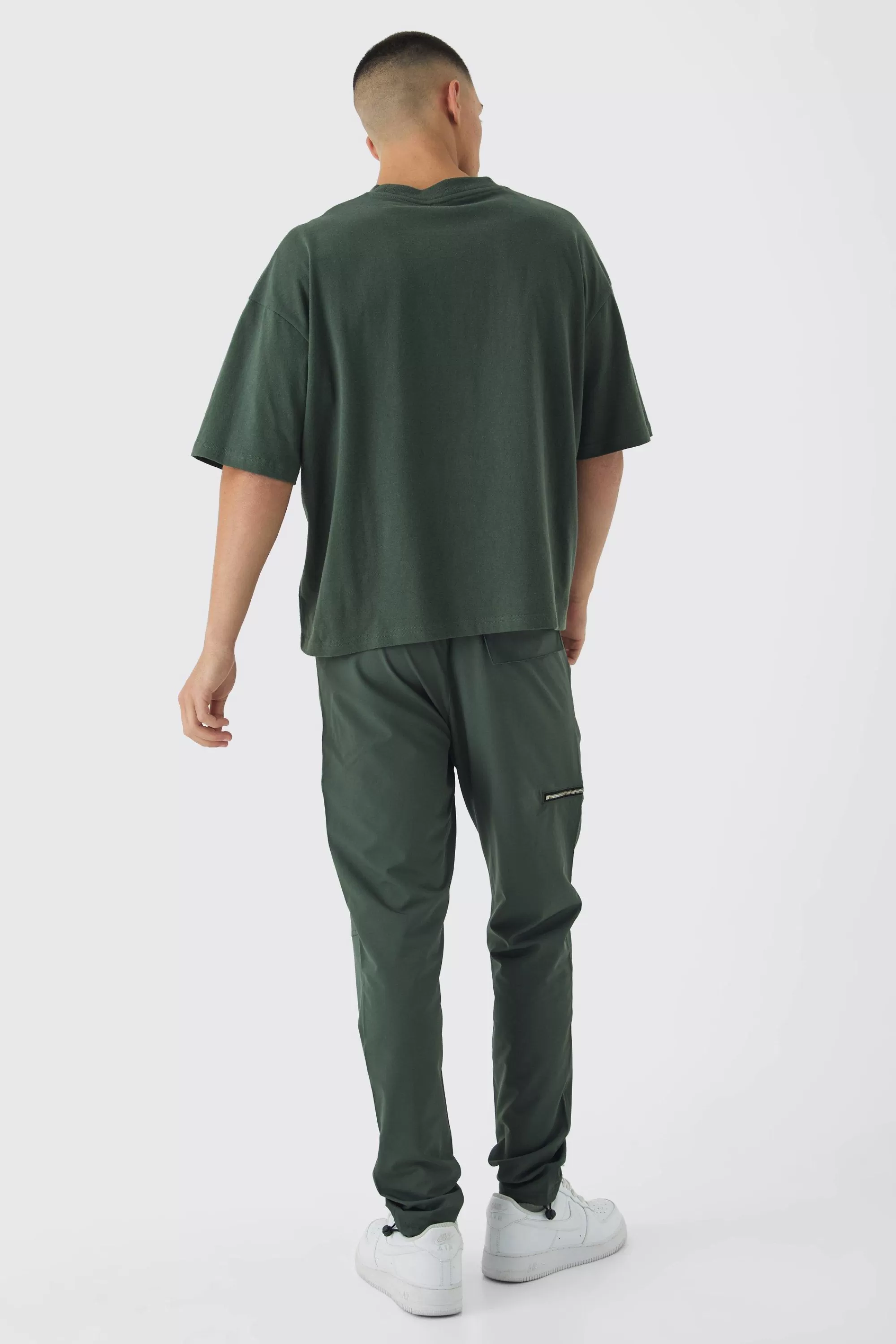 boohooMAN Elasticated Waist Skinny Utility Zip Pocket Trousers | UK