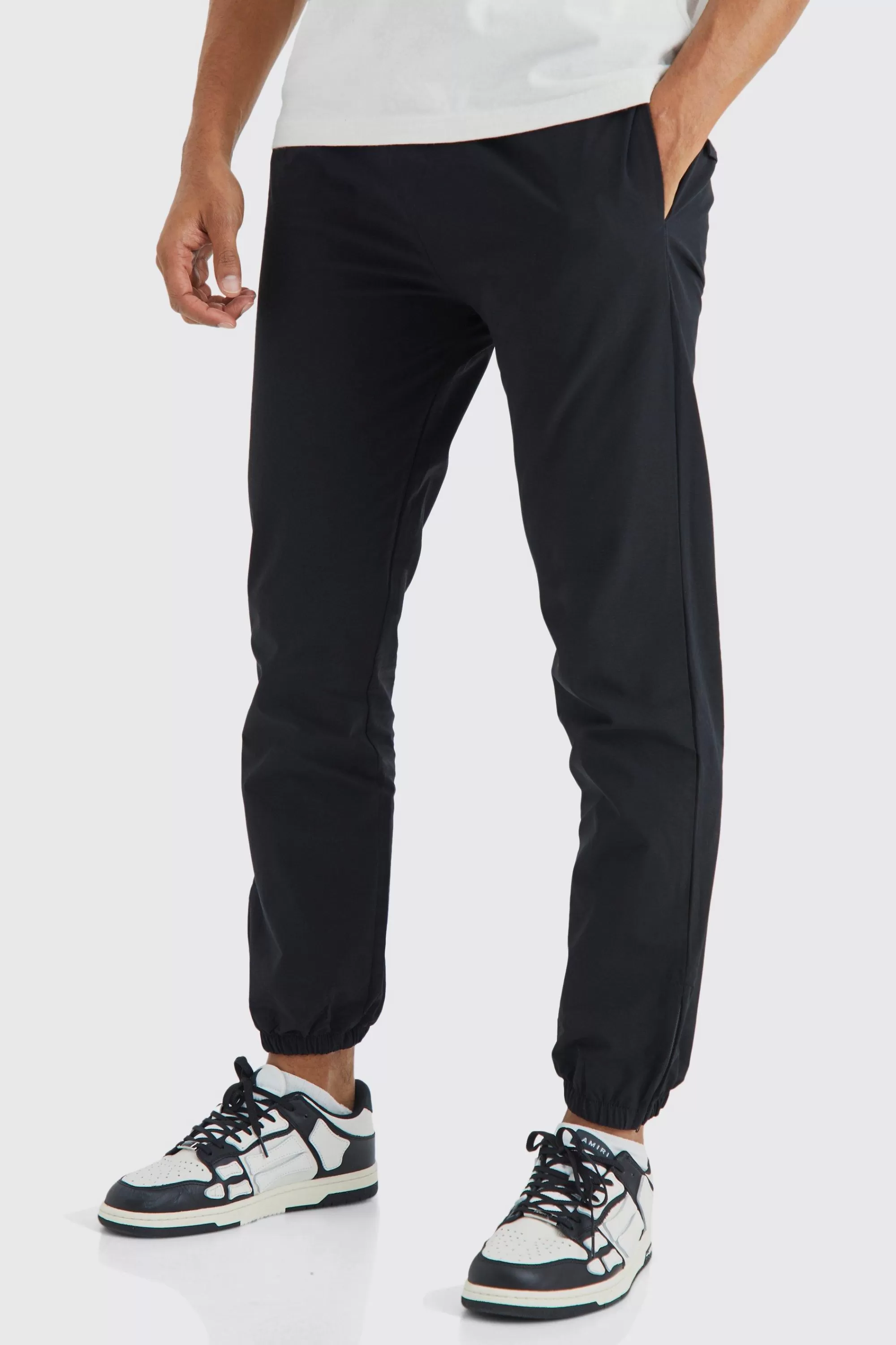 boohooMAN Elasticated Waist Slim Fit Technical Stretch Jogger | UK