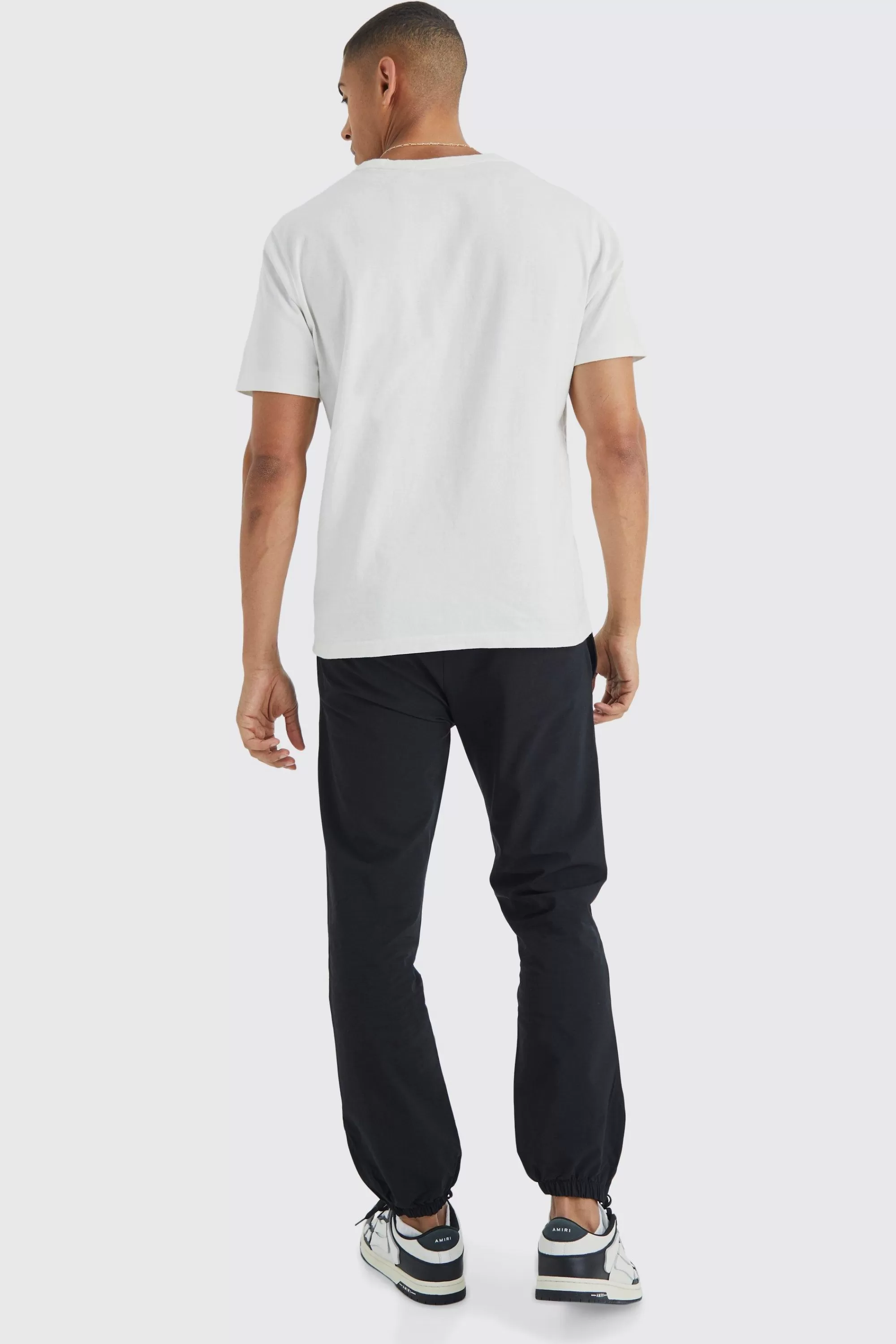 boohooMAN Elasticated Waist Slim Fit Technical Stretch Jogger | UK