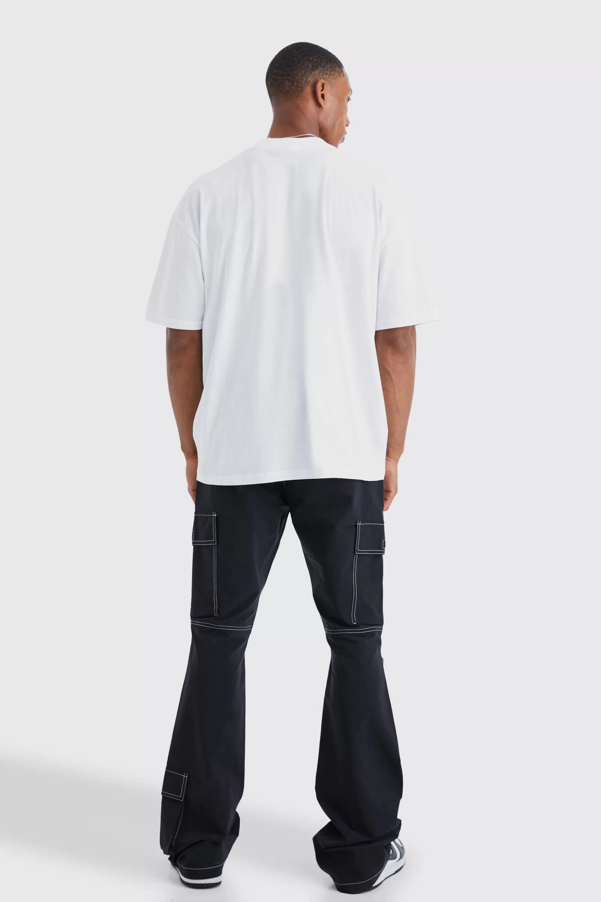 boohooMAN Elasticated Waist Slim Flare Contrast Stitch Cargo Trouser | UK